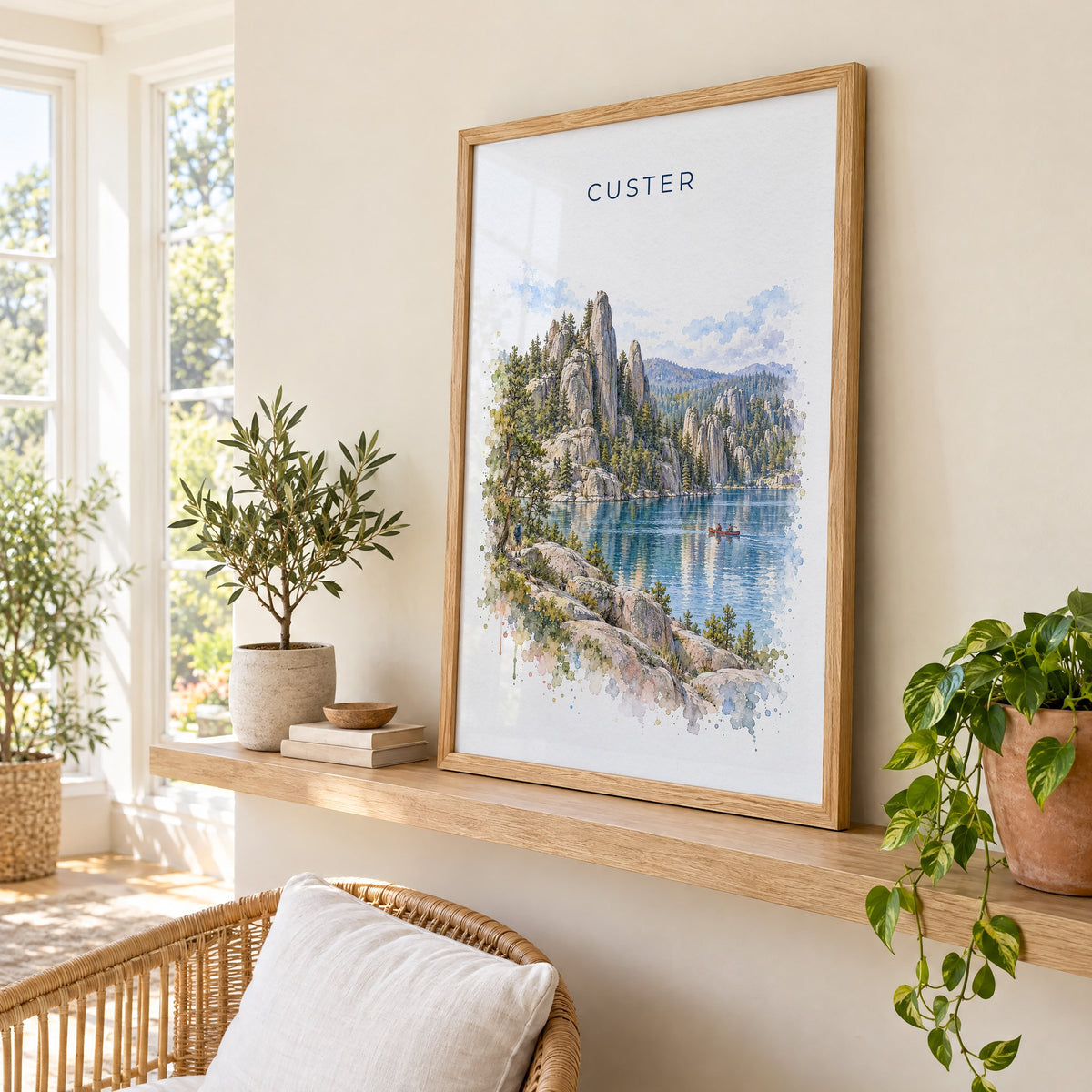 Custer State Park watercolor print in an oak frame on a picture ledge in a sunlit sunroom