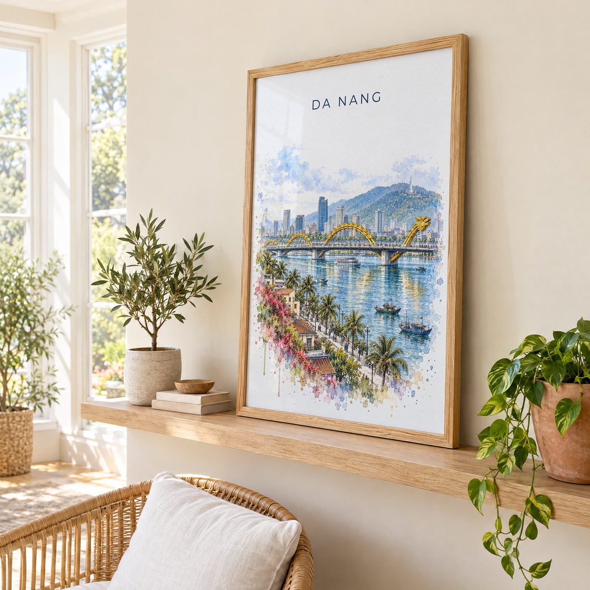 Da Nang watercolor print in an oak frame on a picture ledge in a sunlit sunroom
