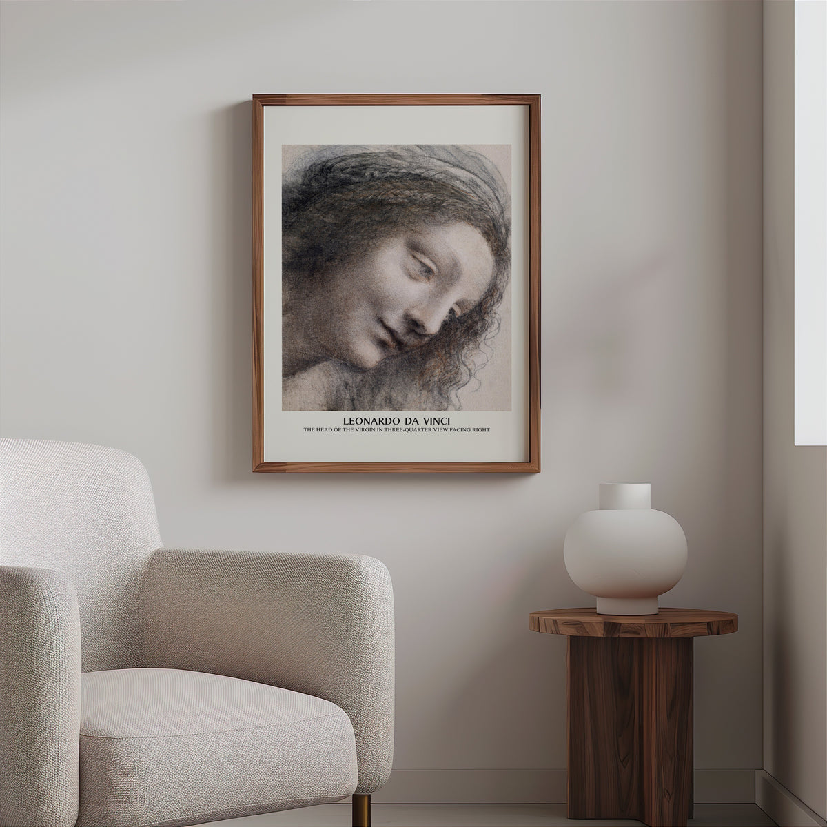 Chalk drawing print in a slim walnut frame above a bouclé armchair
