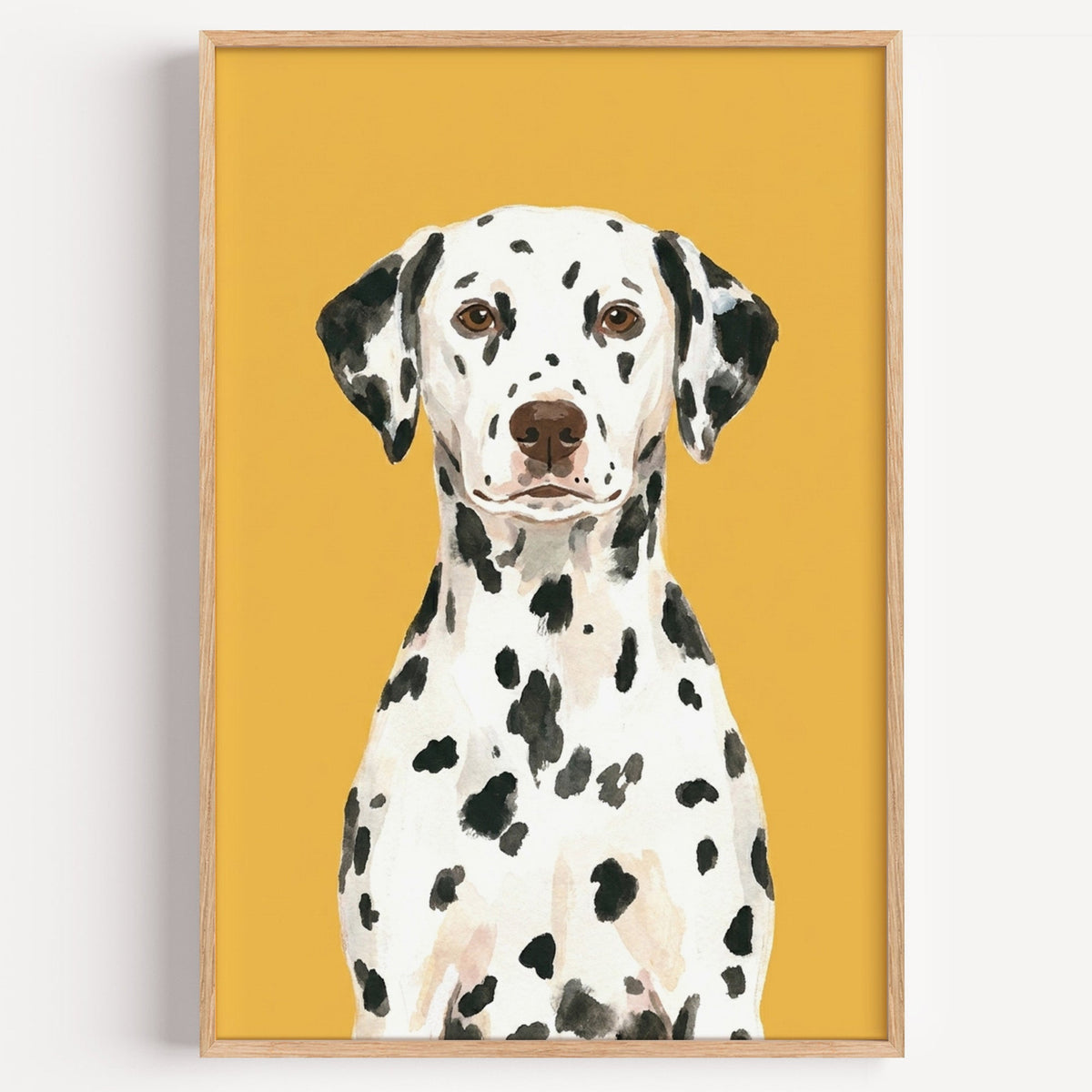 Dalmatian portrait print in a light oak frame on a plain white wall
