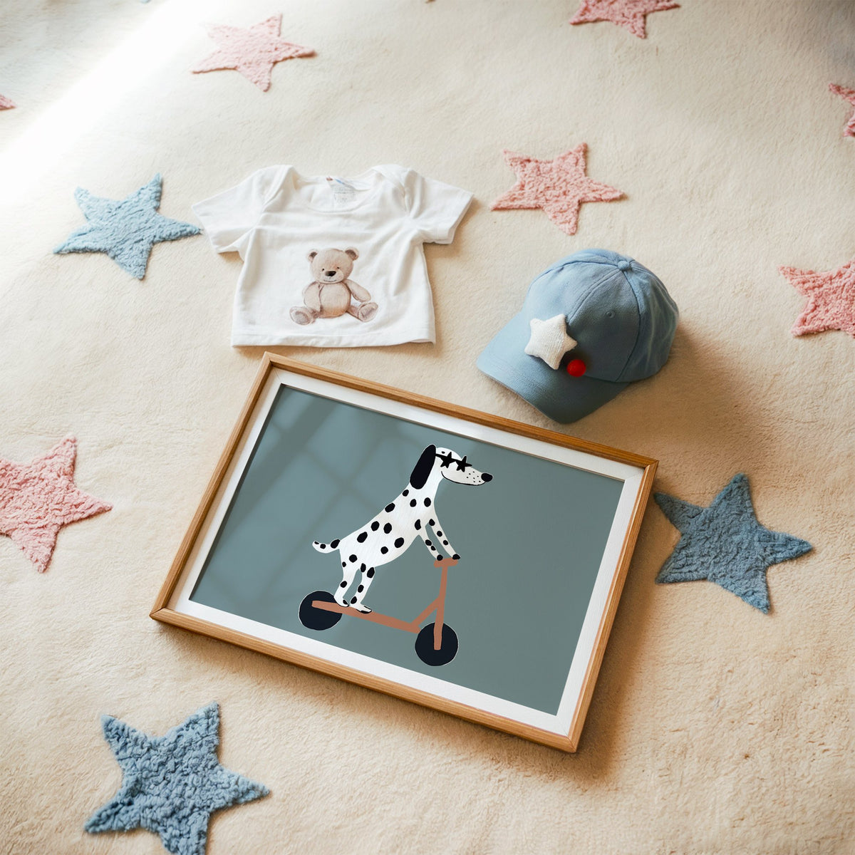 Landscape dalmatian on scooter star glasses nursery print in a matted oak frame on a star rug with a baby tee