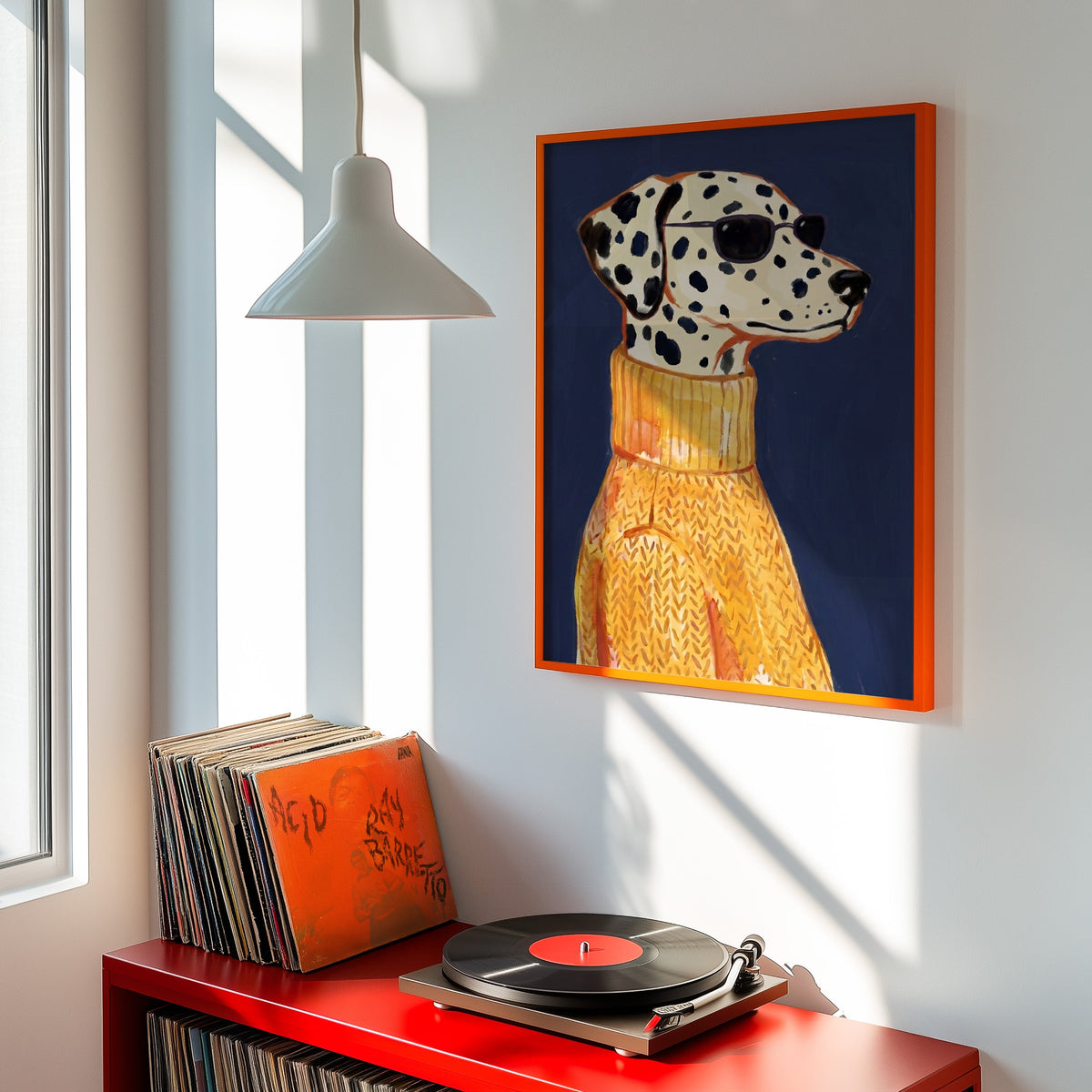 Cool Dalmatian print shown in an orange frame above a red record cabinet and turntable