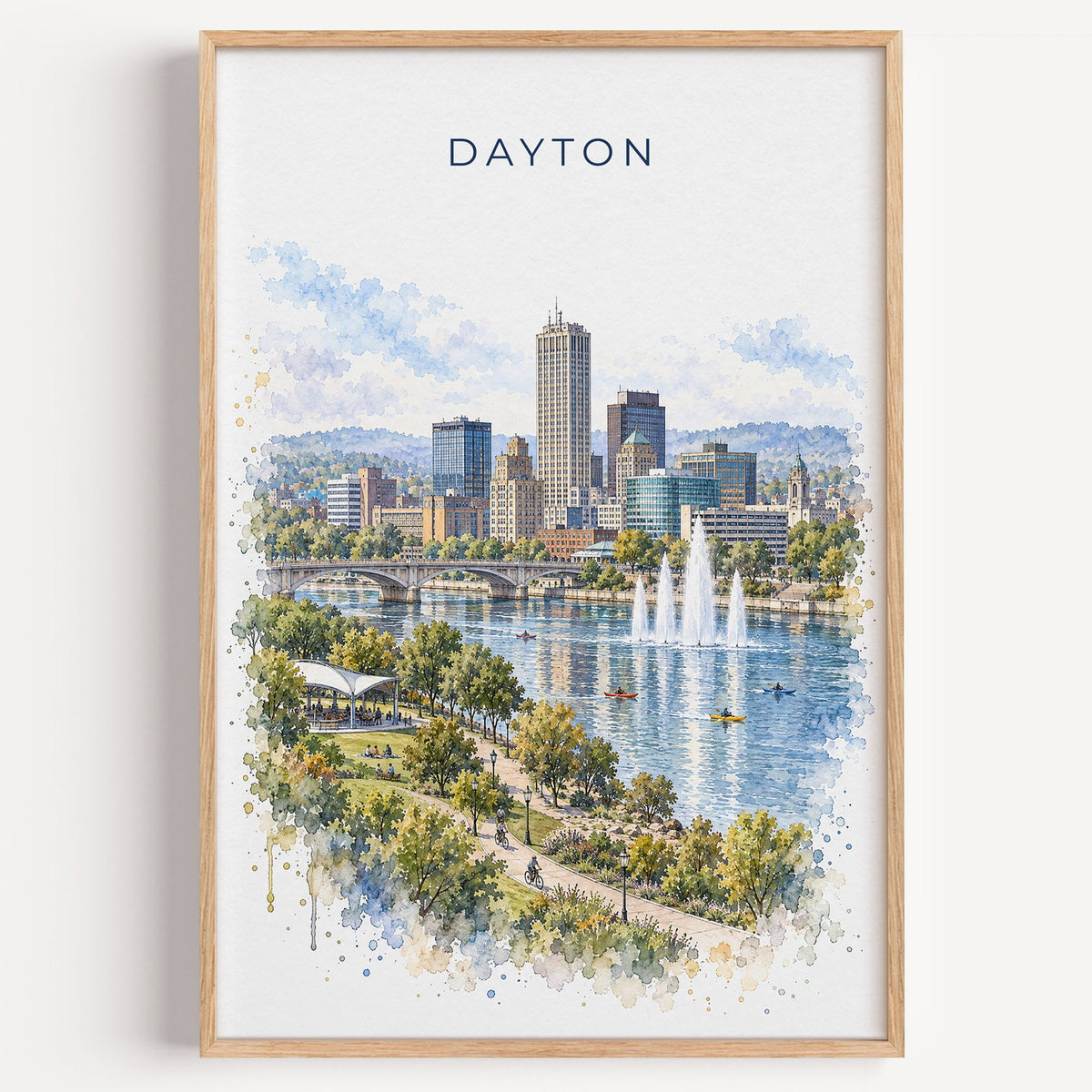 Dayton, Ohio watercolor print in a light oak frame on a plain white wall