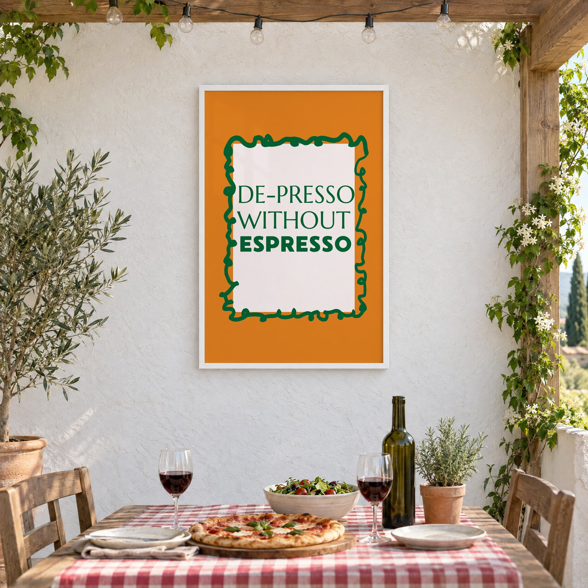 DE-PRESSO WITHOUT ESPRESSO type print in a white frame on a stucco wall above a checked-cloth table with pizza and red wine