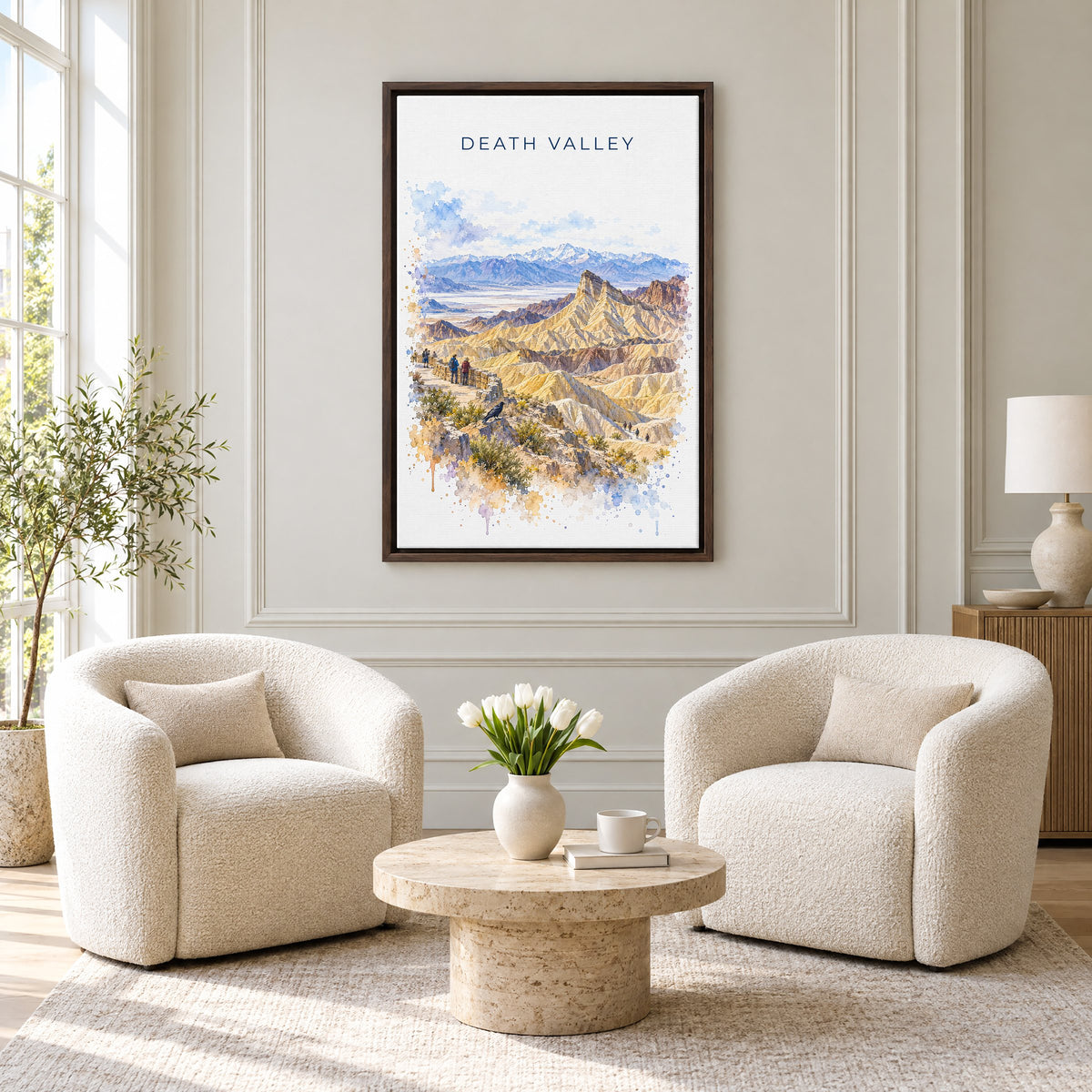 Death Valley National Park watercolor print as an espresso floater canvas above two boucle armchairs in a hotel lounge