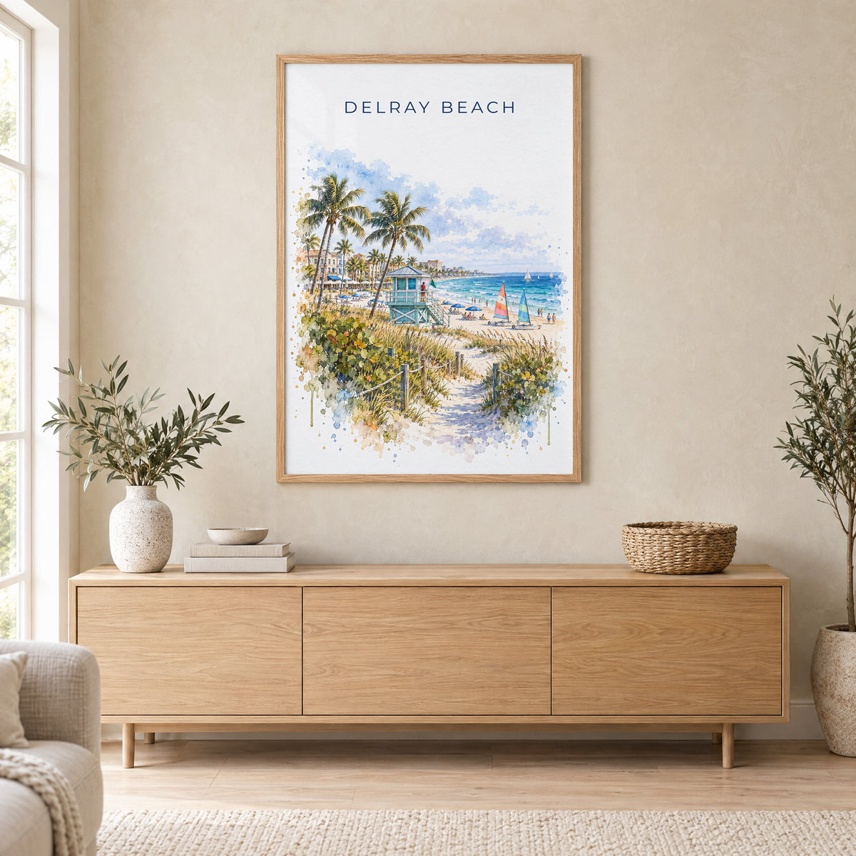 Delray Beach watercolor print in an oak frame above a light wood sideboard in a Scandinavian living room