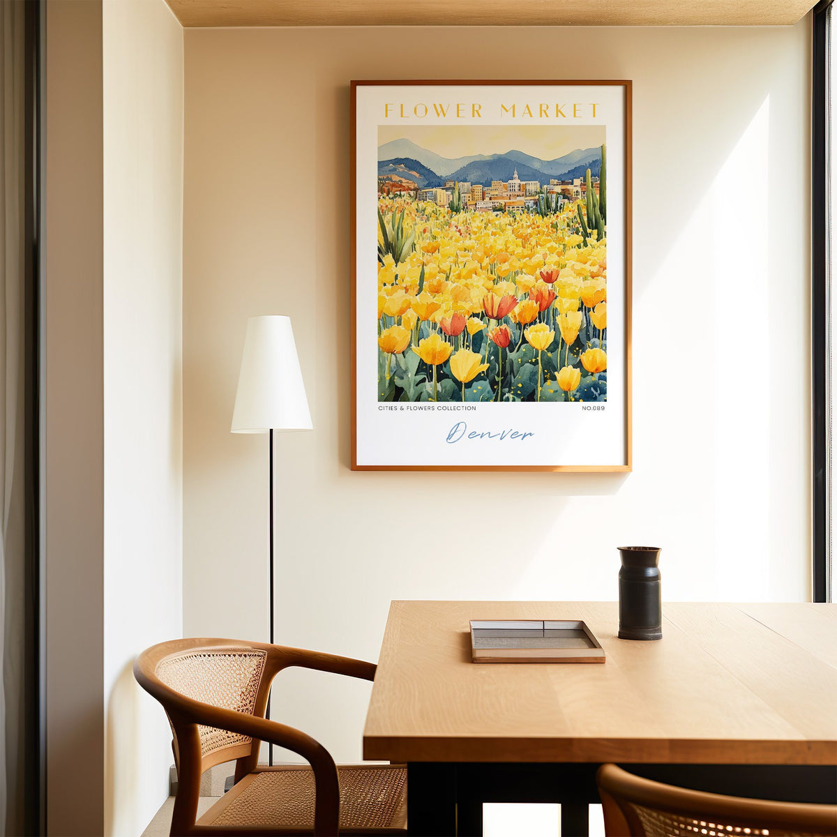 Denver flower market print in an oak frame above a dining table and cane chair