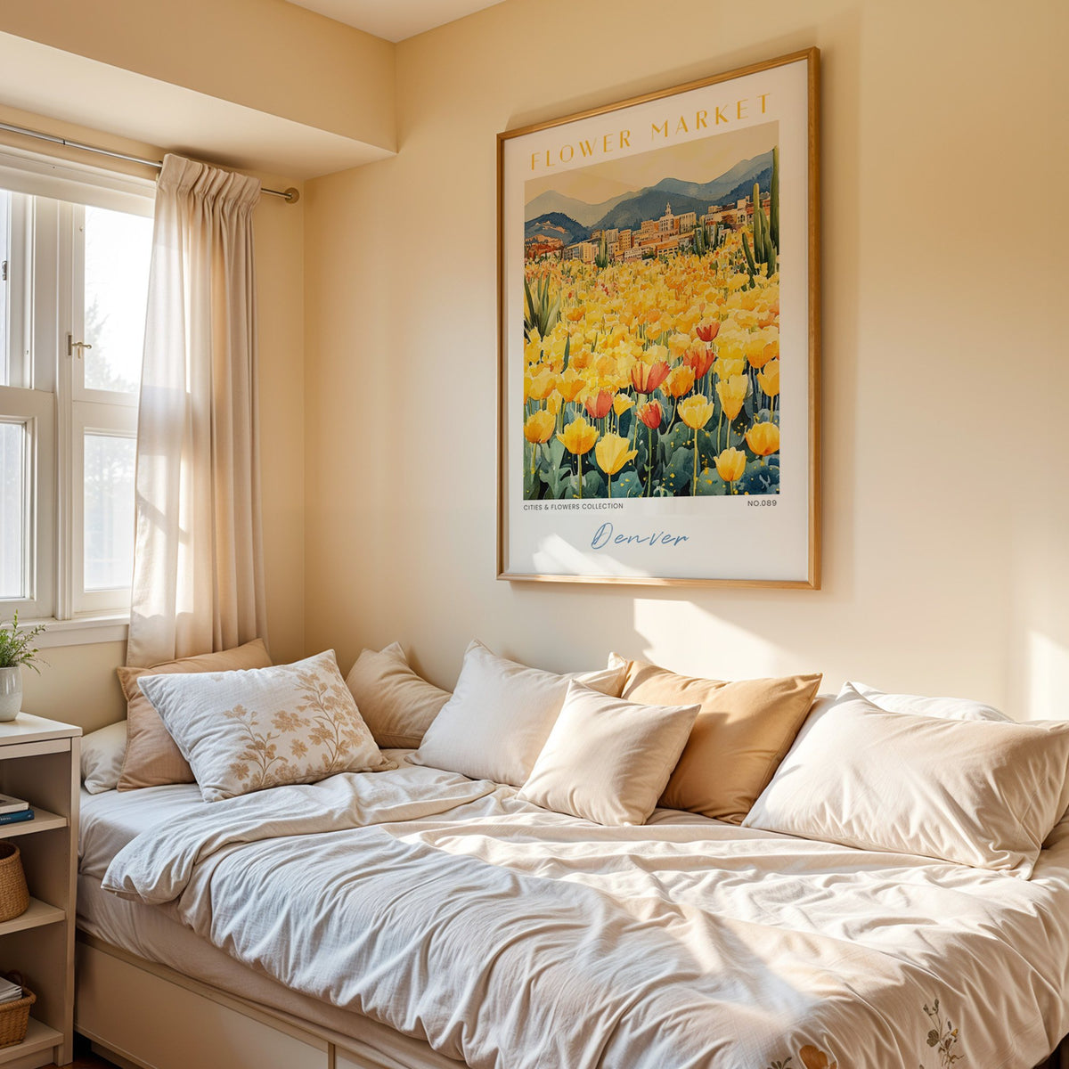 Denver flower market print in an oak frame above a cream daybed in a sunny bedroom