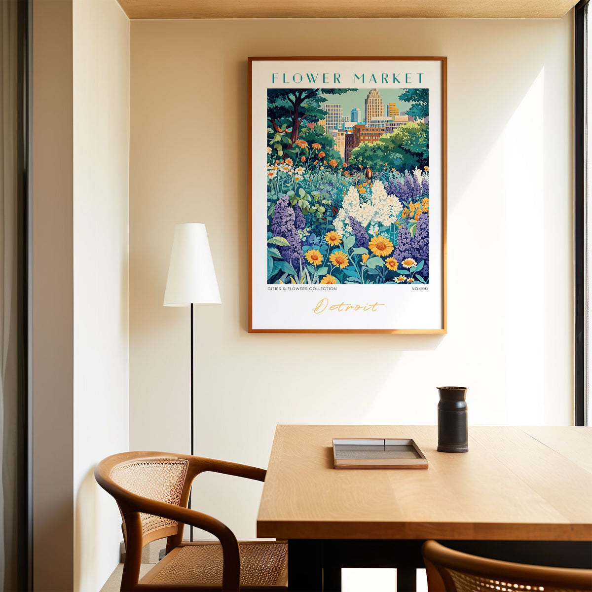 Detroit flower market print in an oak frame above a dining table and cane chair