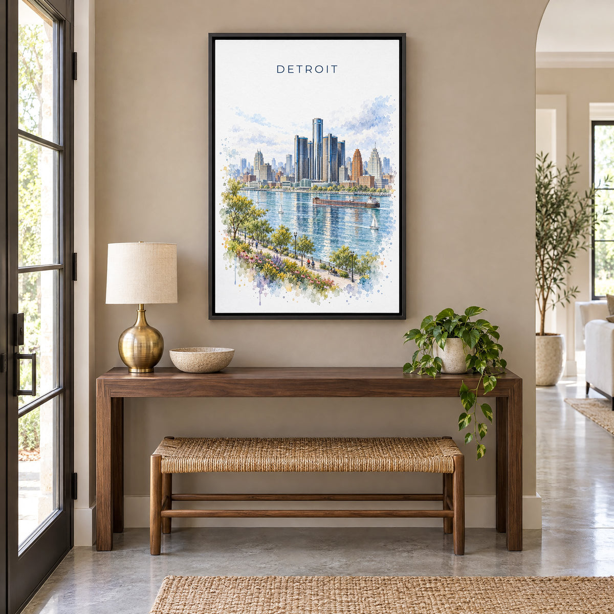 Detroit watercolor print as a black floater canvas above a walnut console and woven bench in an entryway