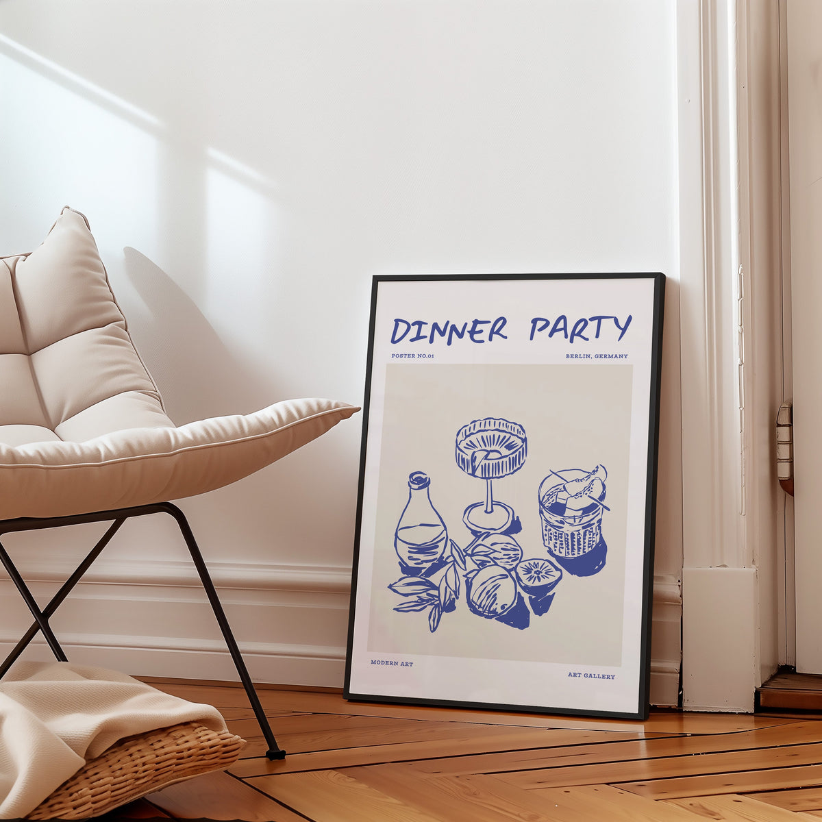 Dinner Party citrus drinks print in a black frame on a parquet floor