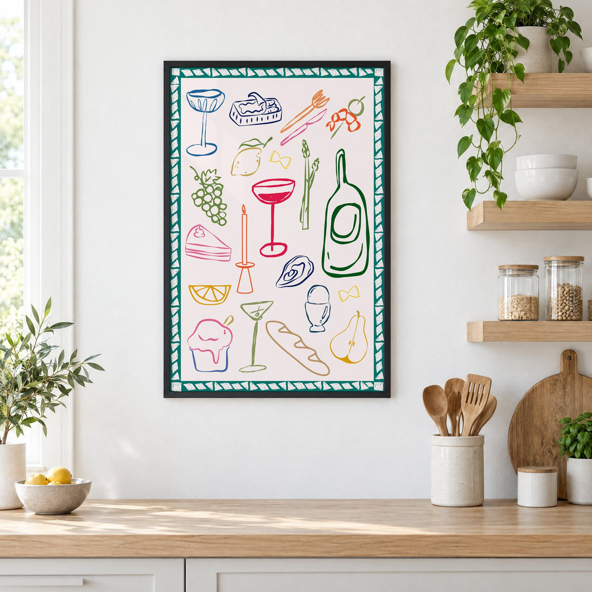 Dinner party doodles teal border print in a black frame in a white kitchen beside open wood shelves and glass jars