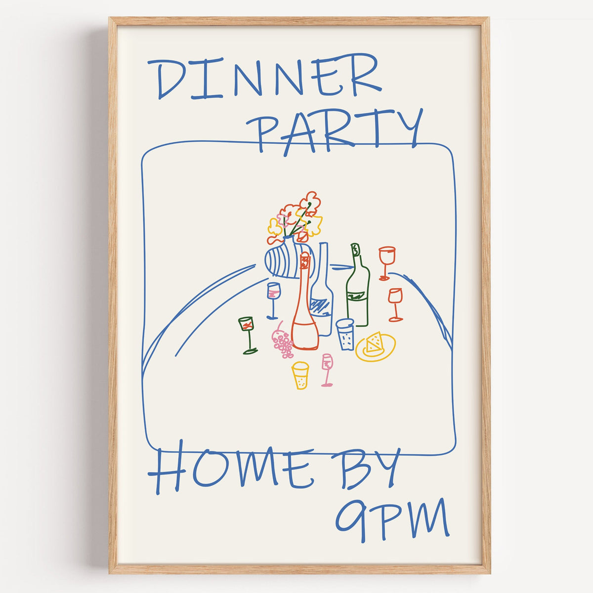 Dinner party blue line print in a light oak frame on a plain white wall