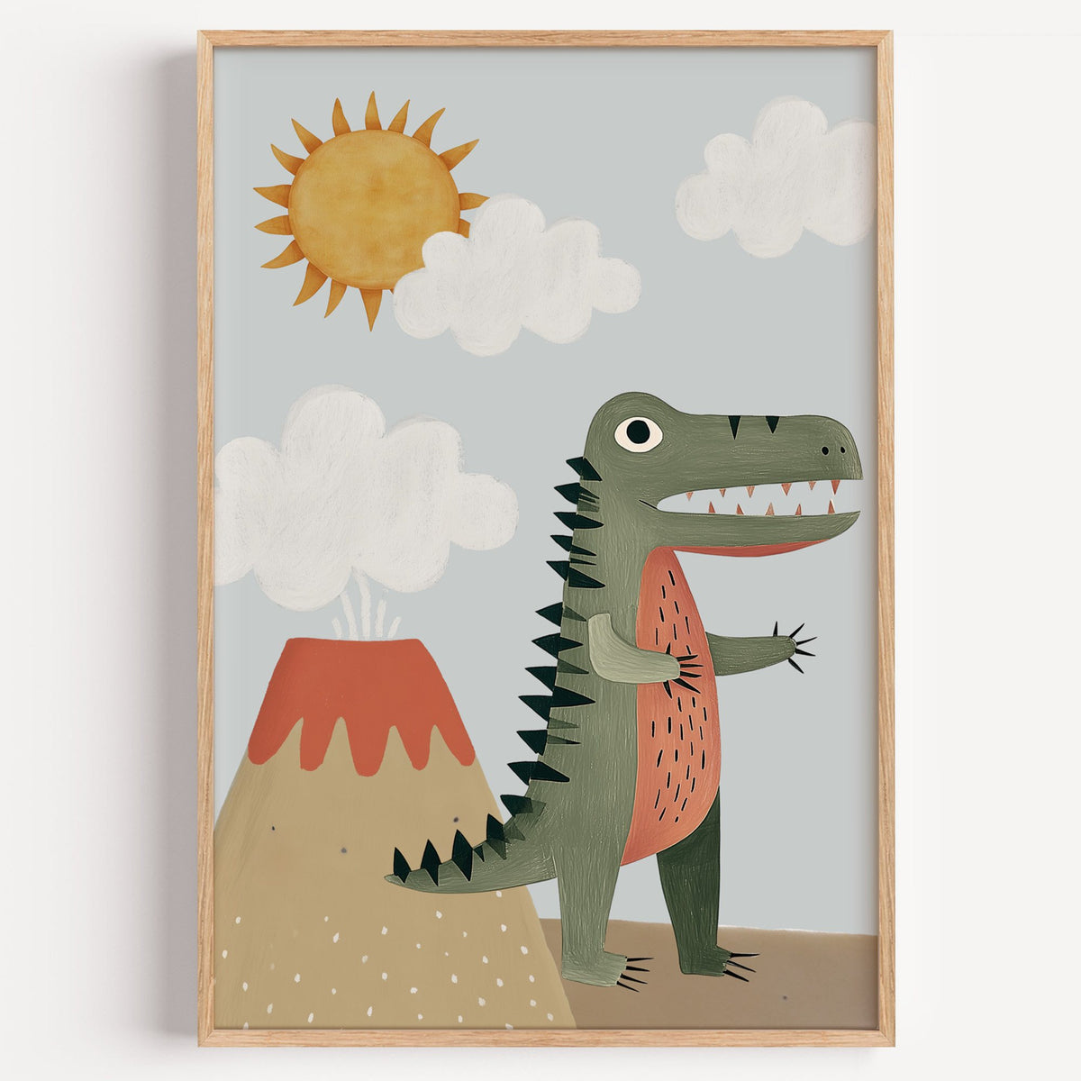 Dinosaur and volcano nursery print in a light oak frame on a plain white wall
