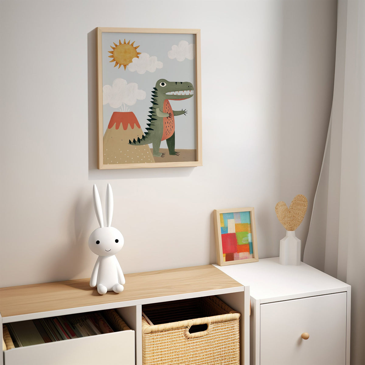 Dinosaur and volcano nursery print in an oak frame above a kids cubby shelf with a woven basket and bunny lamp