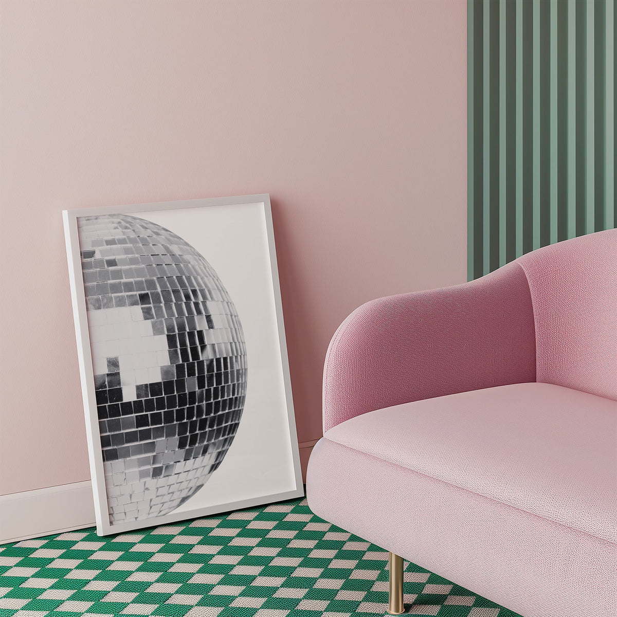 Disco mirror ball close-up print in a white frame beside a pink armchair on a checkered floor