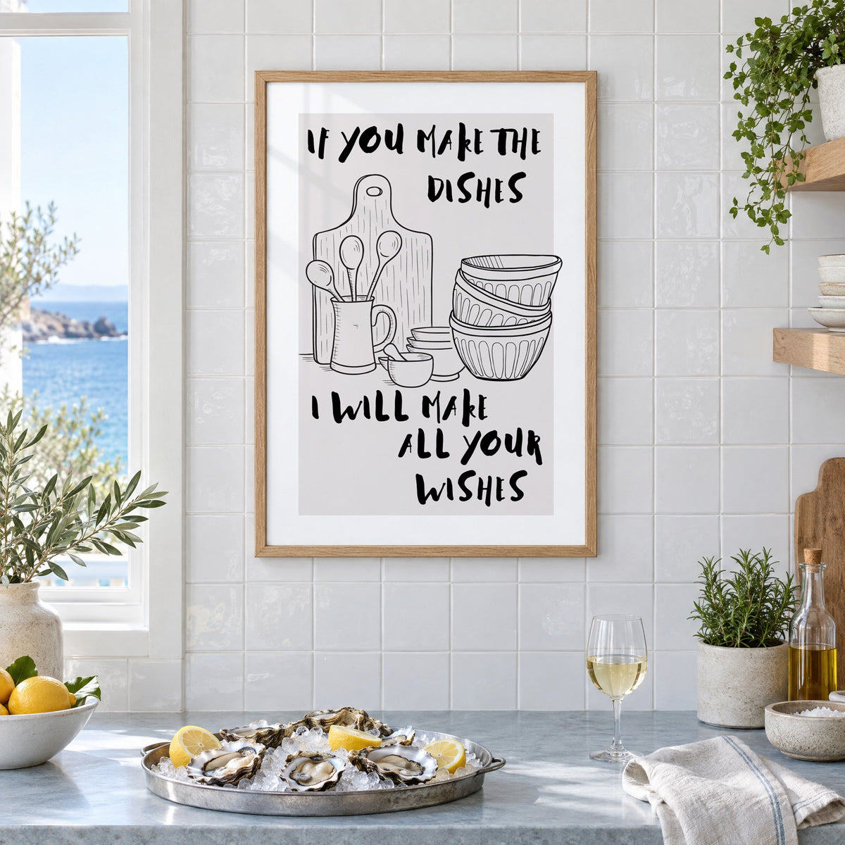 IF YOU MAKE THE DISHES kitchenware sketch print in an oak frame on white tiles above a marble counter with oysters and lemons by a sea view