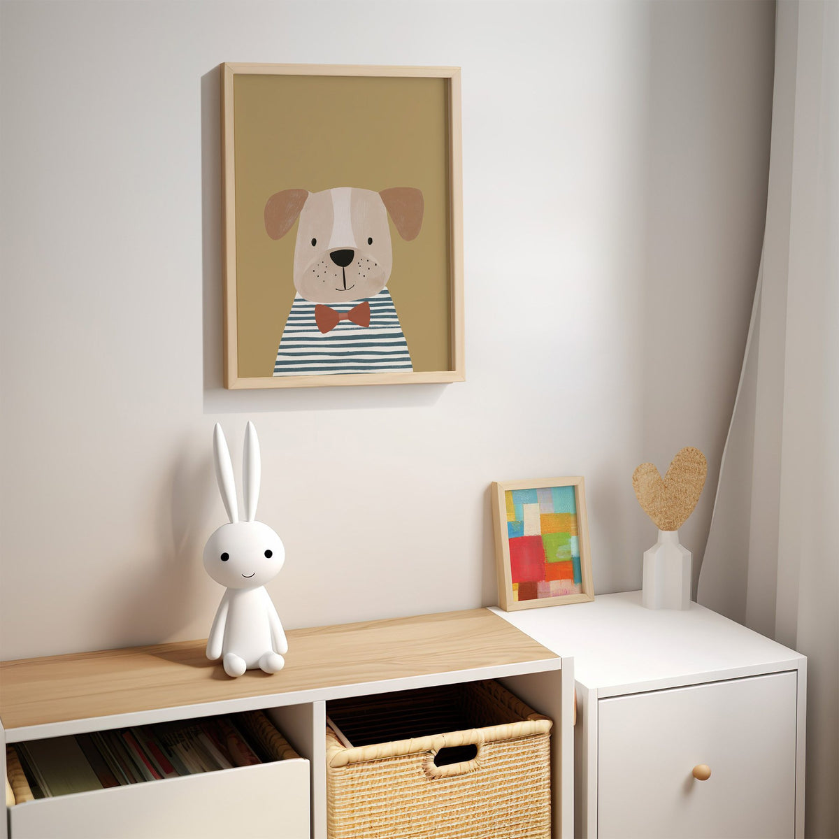 Dog in bow tie portrait nursery print in an oak frame above a kids cubby shelf with a woven basket and bunny lamp