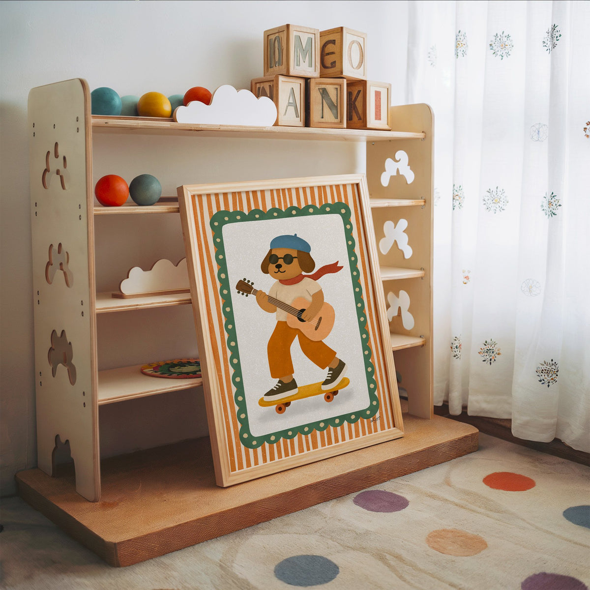 Brown dog with guitar on skateboard nursery print in an oak frame leaning on a toy shelf with wooden letter blocks