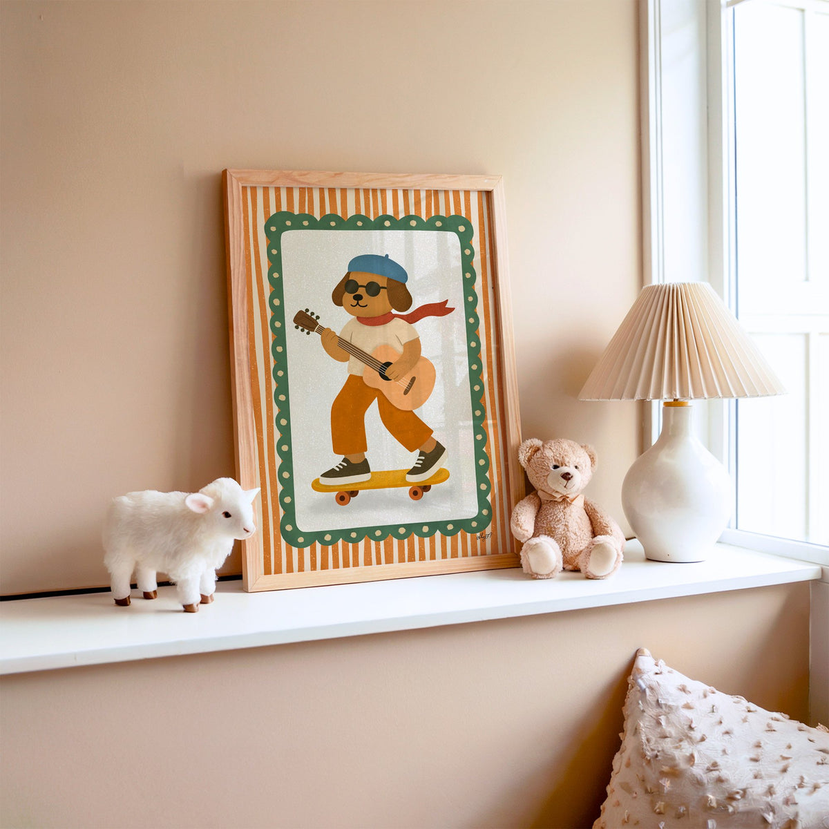 Brown dog with guitar on skateboard nursery print in an oak frame on a window ledge with a toy lamb and teddy