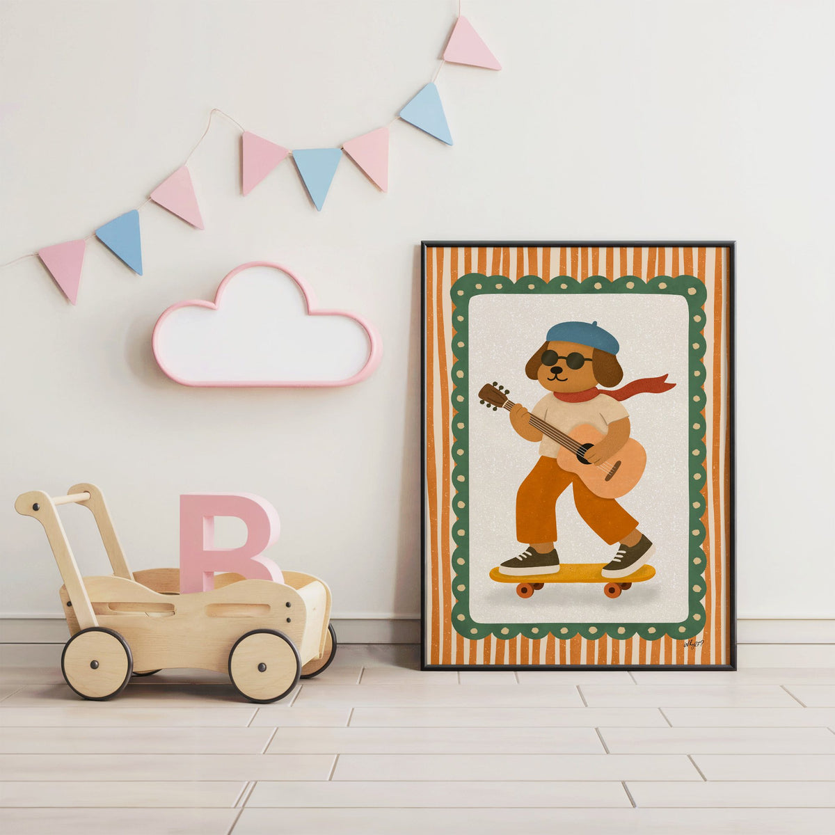 Brown dog with guitar on skateboard nursery print in a black frame under pastel bunting by a wooden baby walker