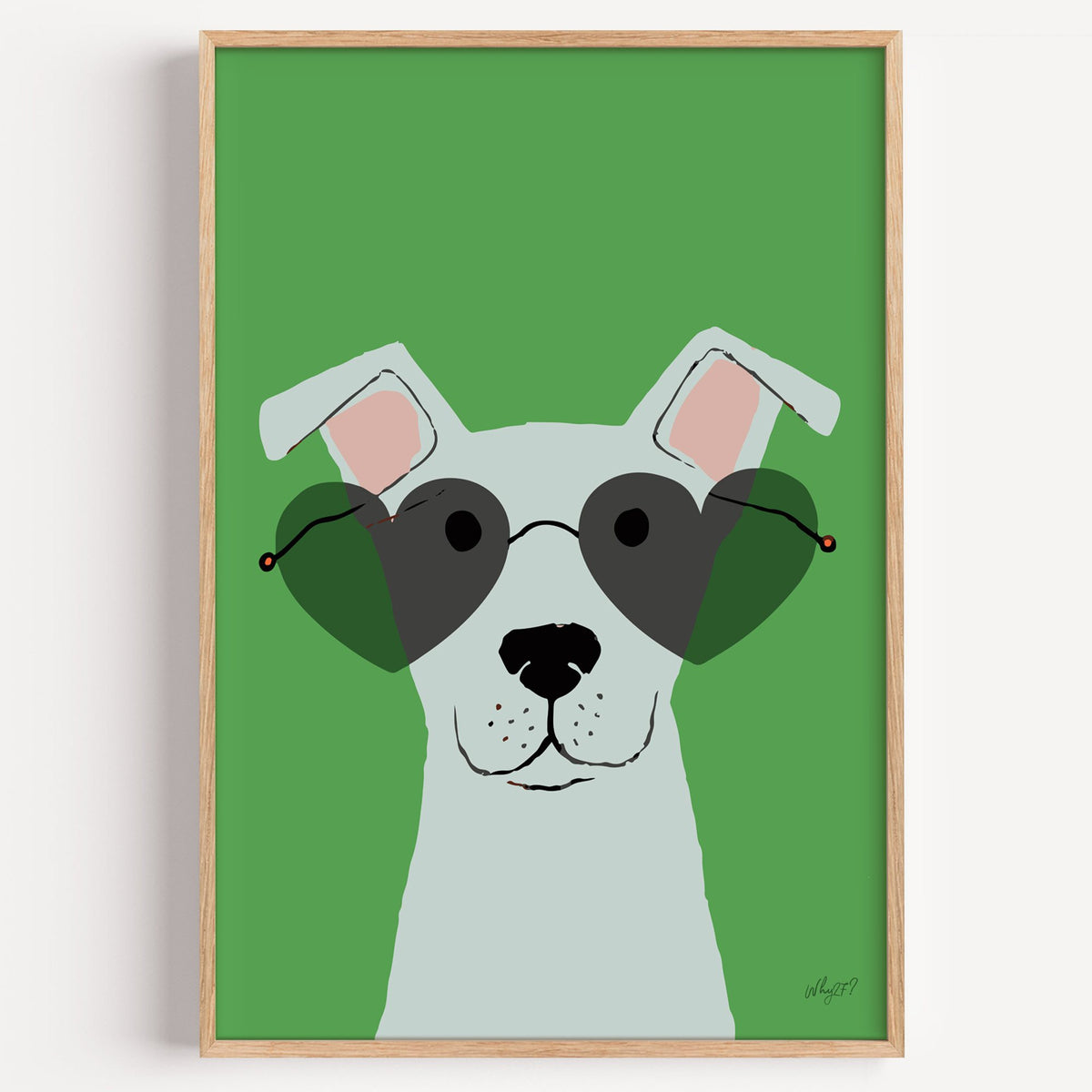White dog in heart sunglasses nursery print in a light oak frame on a plain white wall