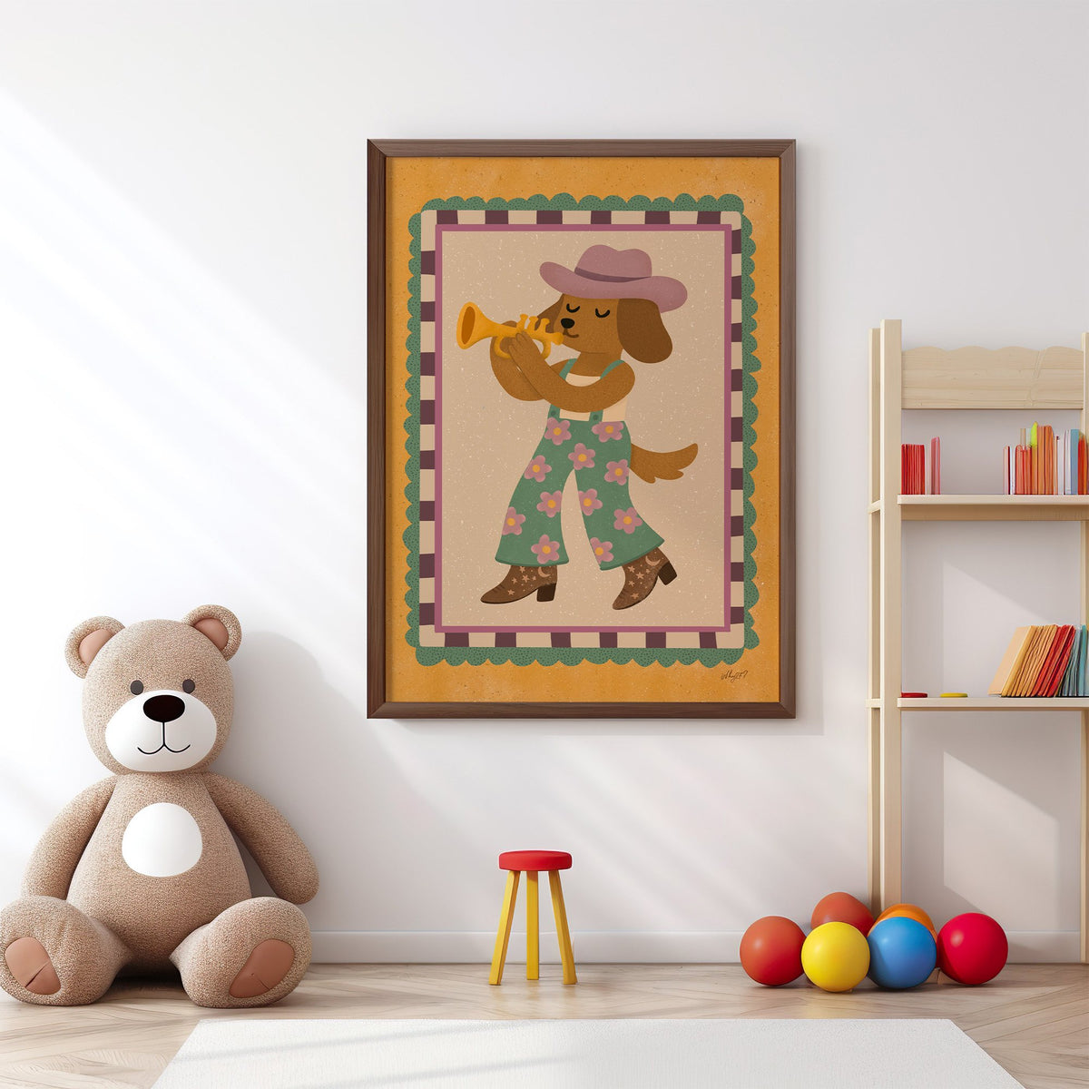 Dog playing trumpet in cowboy hat nursery print in a walnut frame above a big teddy bear by a bookshelf