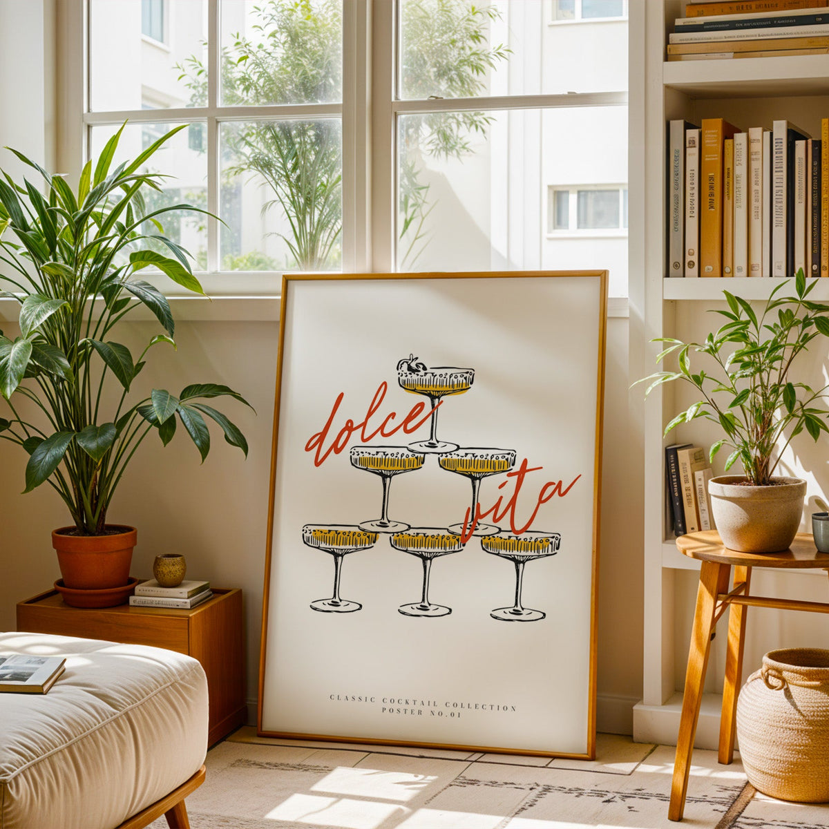 Champagne coupe tower print in a brass frame resting on a berber rug in a living room