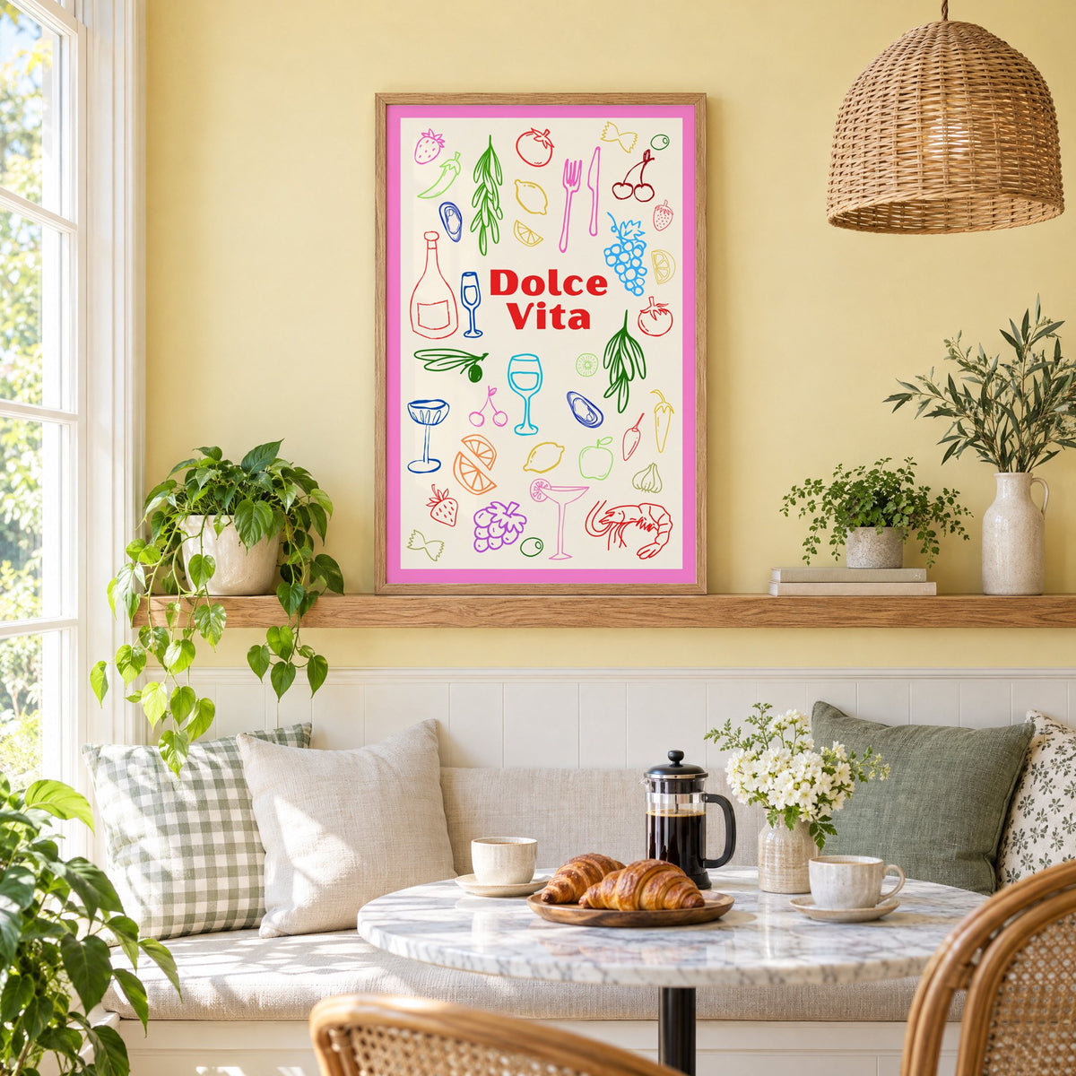 Dolce Vita colorful food doodle print in an oak frame on a picture ledge above a sunny breakfast nook