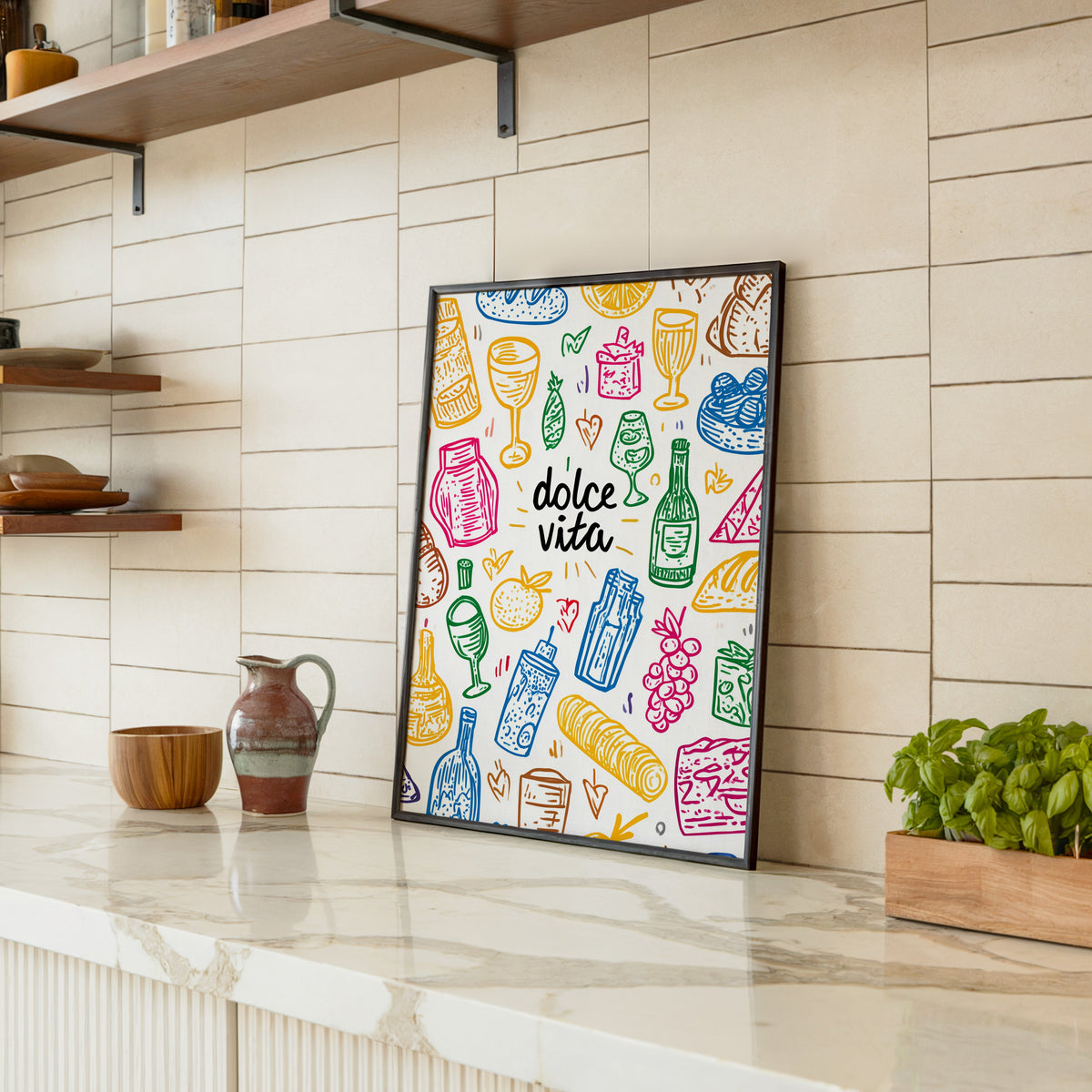 Dolce Vita doodle print in a black frame leaning on a marble counter in a tiled kitchen