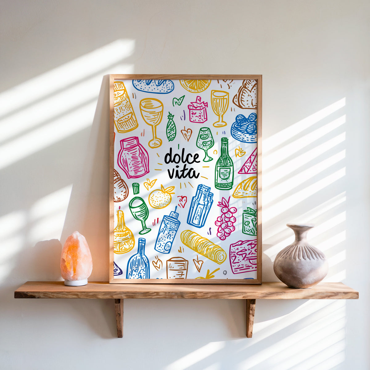 Dolce Vita doodle print in an oak frame on a live-edge shelf beside a salt lamp