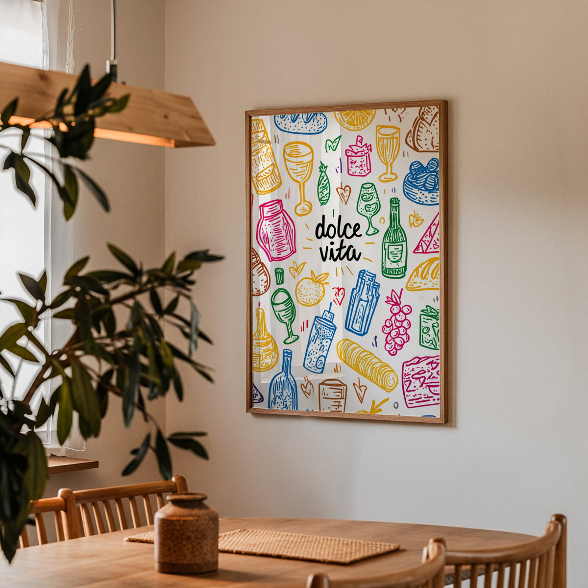 Dolce Vita doodle print in a walnut frame above a dining table with olive branches