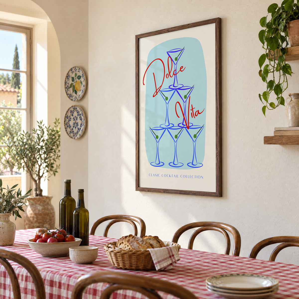 Dolce Vita martini tower print in a walnut frame above a gingham-covered trattoria table, seen at an angle