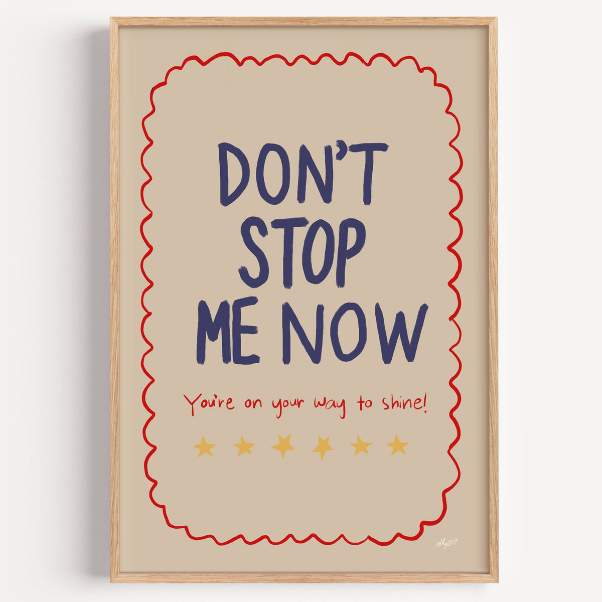 Dont stop me now star lettering nursery print in a light oak frame on a plain white wall