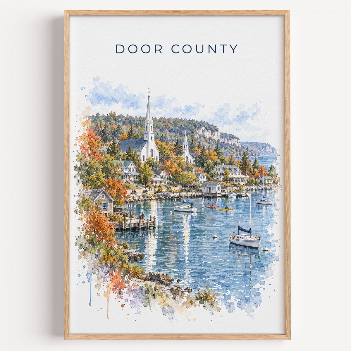 Door County watercolor print in a light oak frame on a plain white wall
