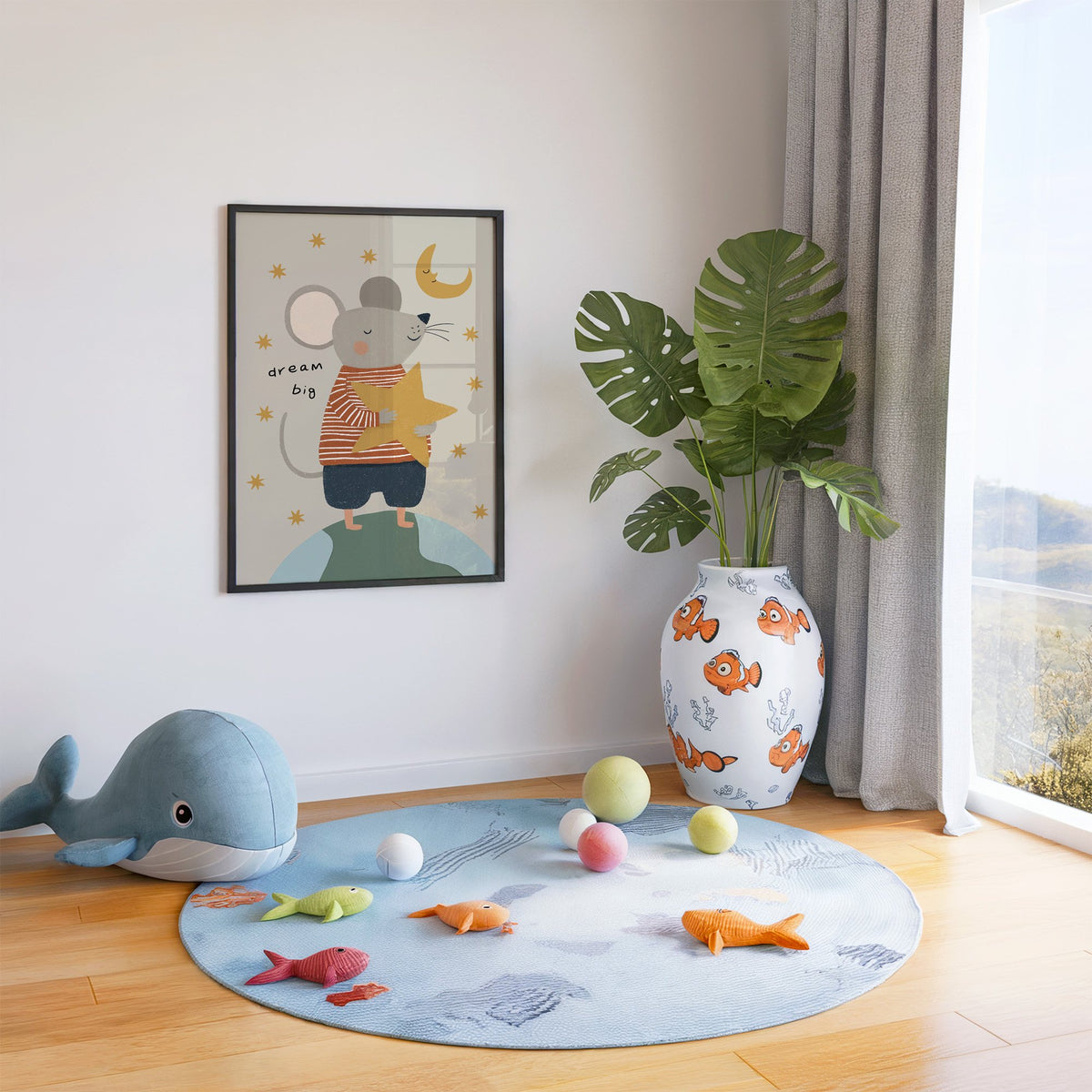 Dream big mouse hugging star nursery print in a black frame in a playroom with an ocean rug and whale plush
