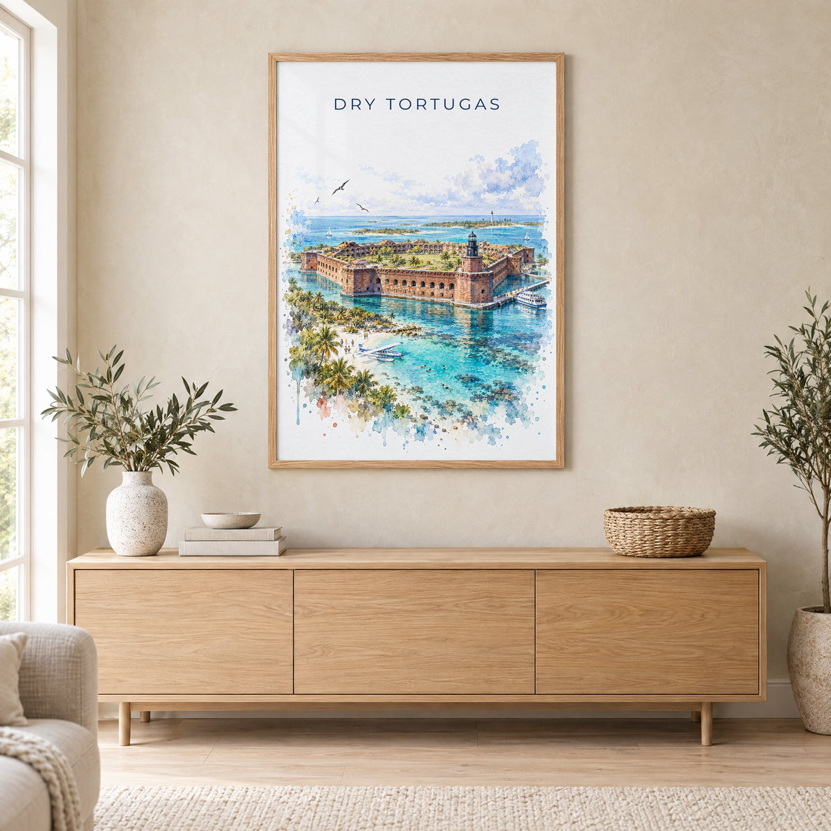 Dry Tortugas National Park watercolor print in an oak frame above a light wood sideboard in a Scandinavian living room