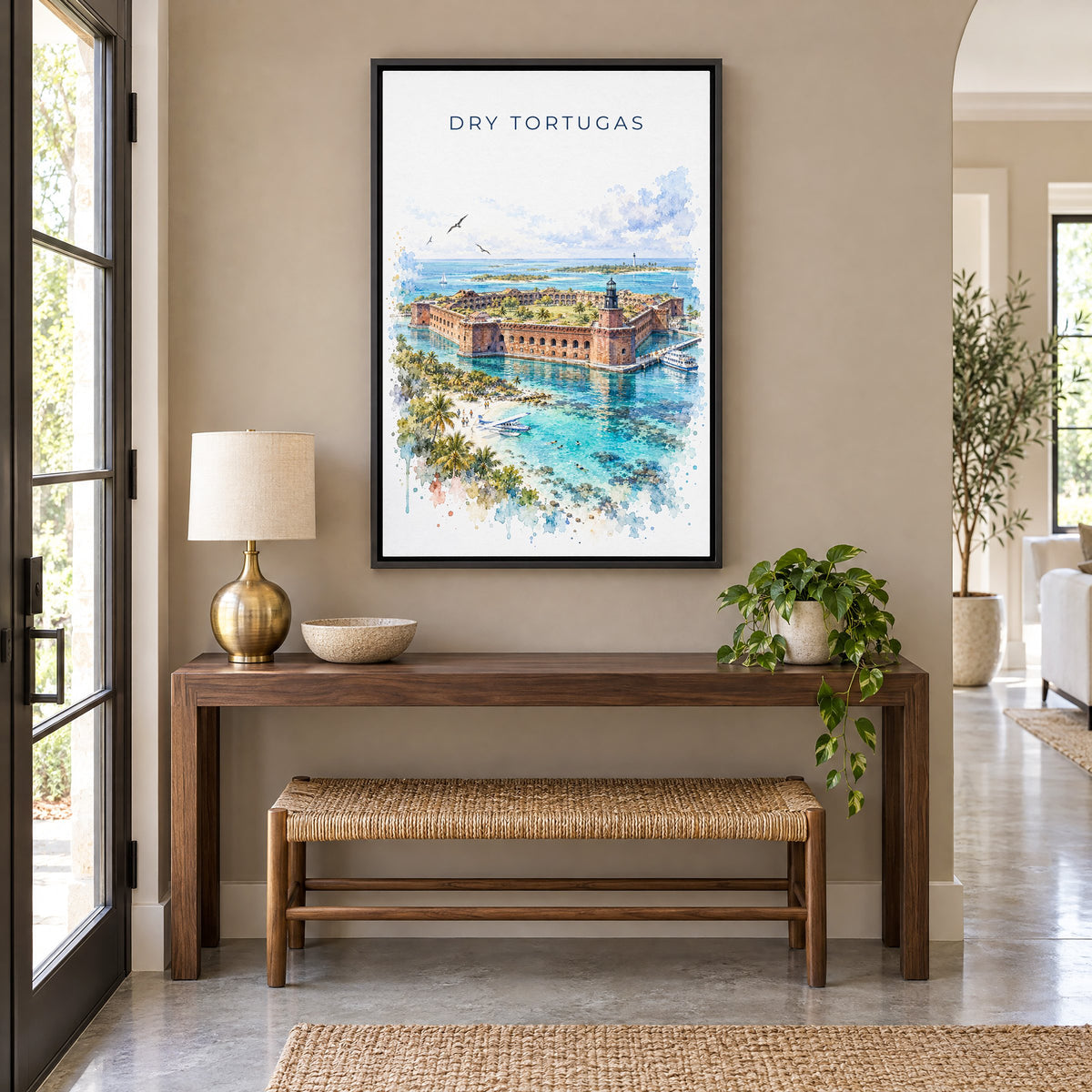 Dry Tortugas National Park watercolor print as a black floater canvas above a walnut console and woven bench in an entryway