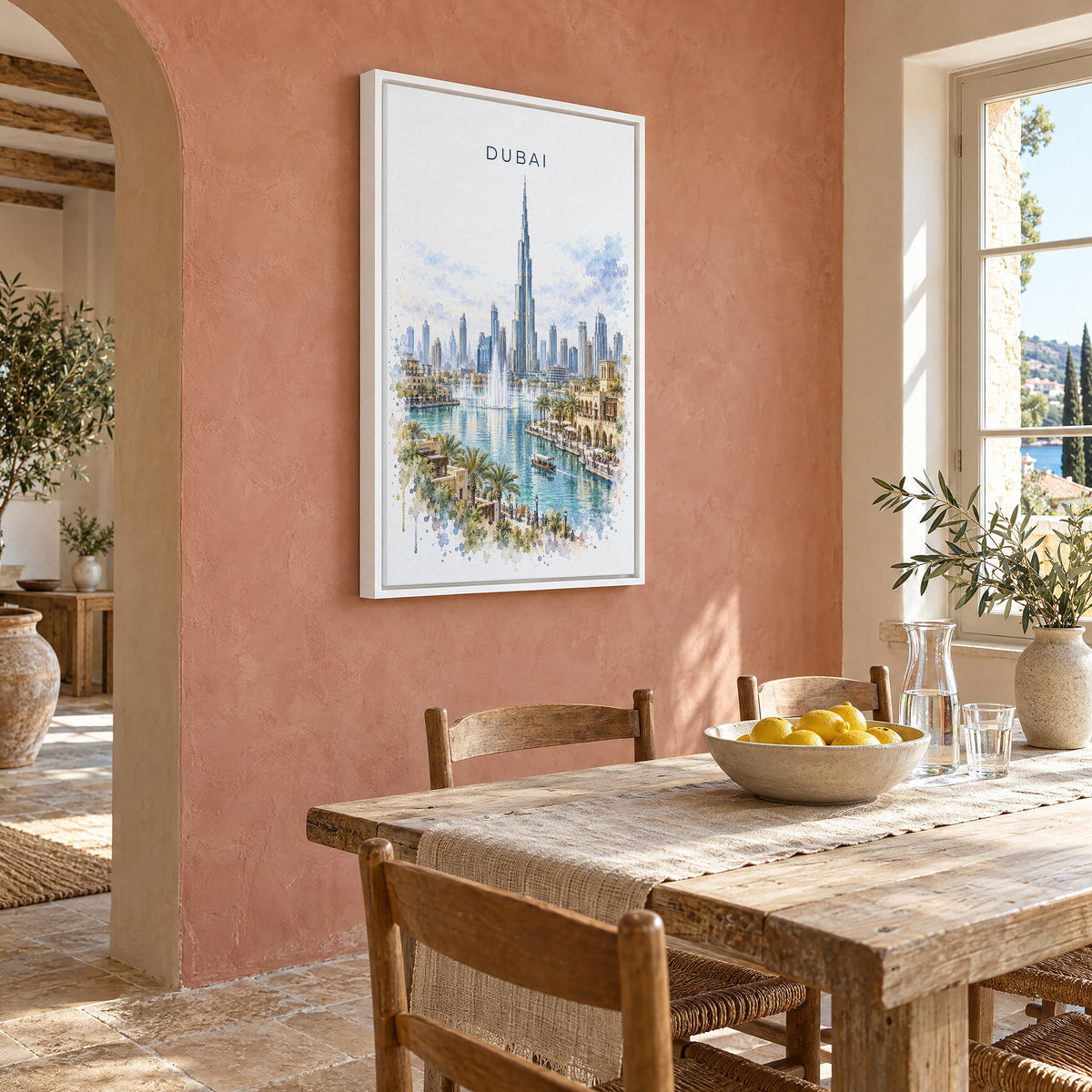 Dubai watercolor print as a white floater canvas on a terracotta wall above a rustic dining table