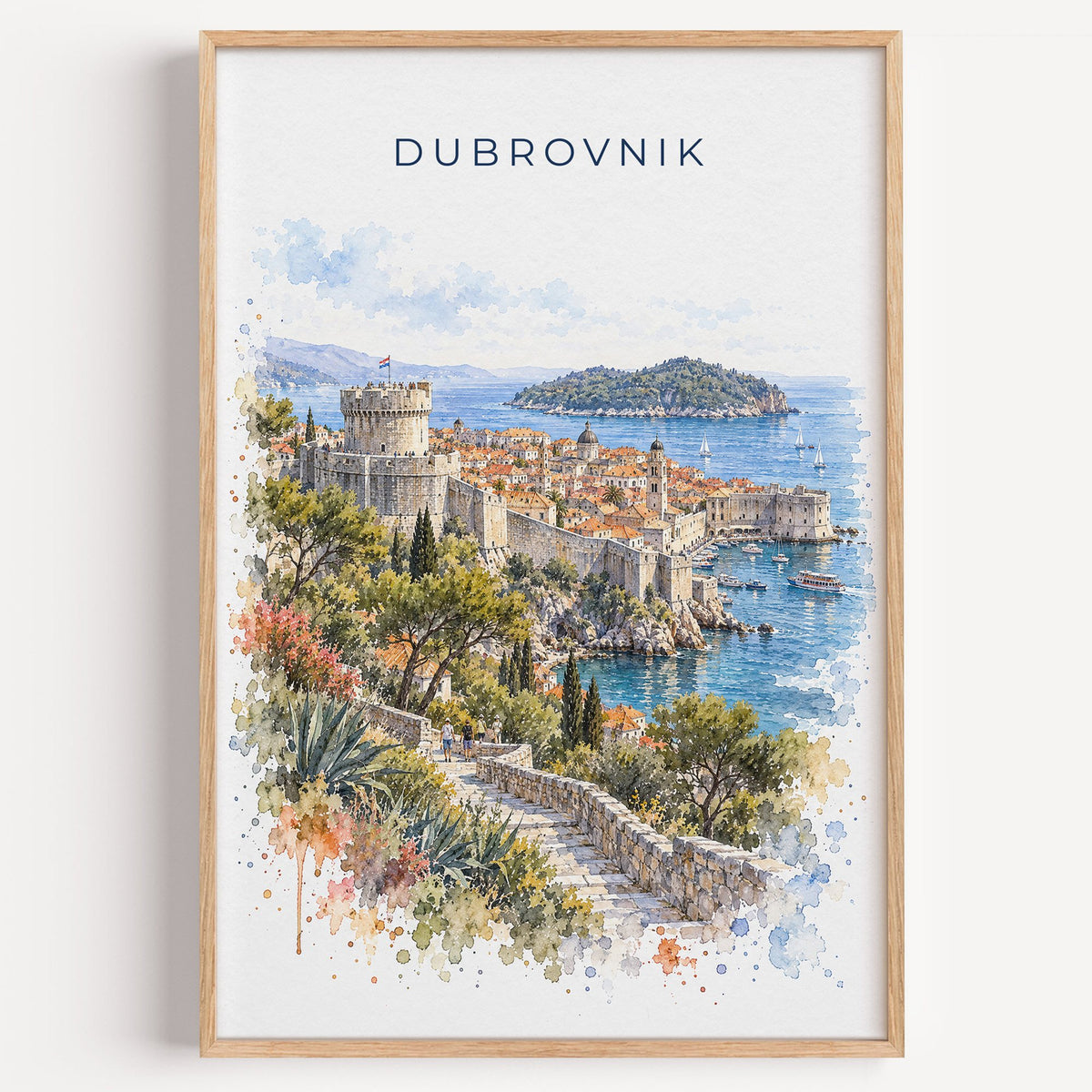Dubrovnik watercolor print in a light oak frame on a plain white wall