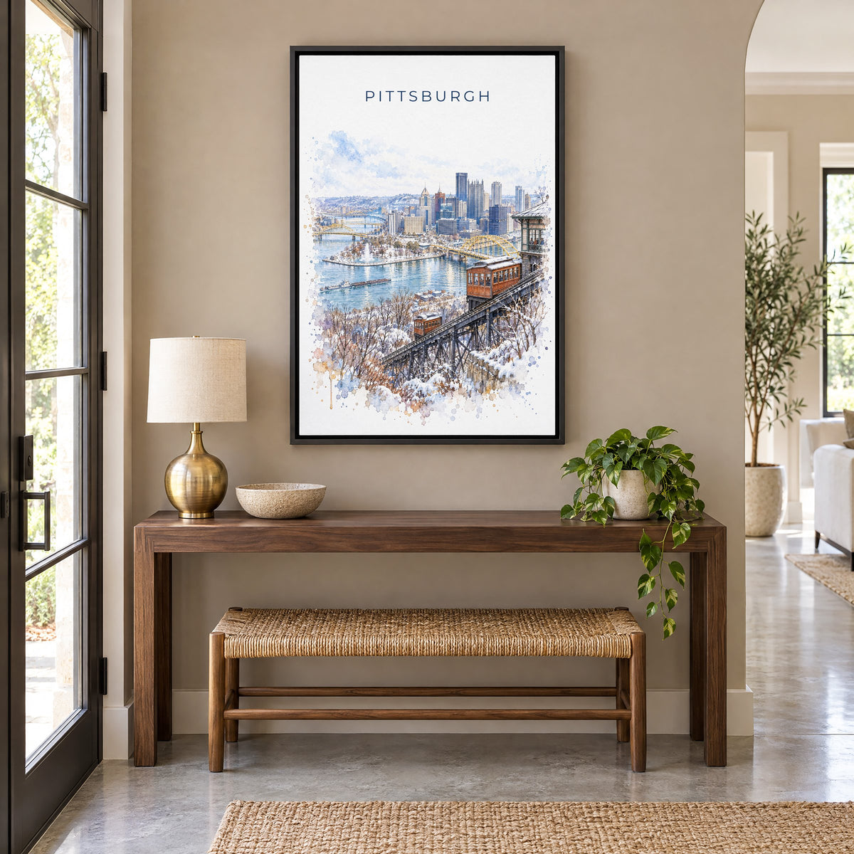 Duquesne Incline Pittsburgh watercolor print as a black floater canvas above a walnut console and woven bench in an entryway