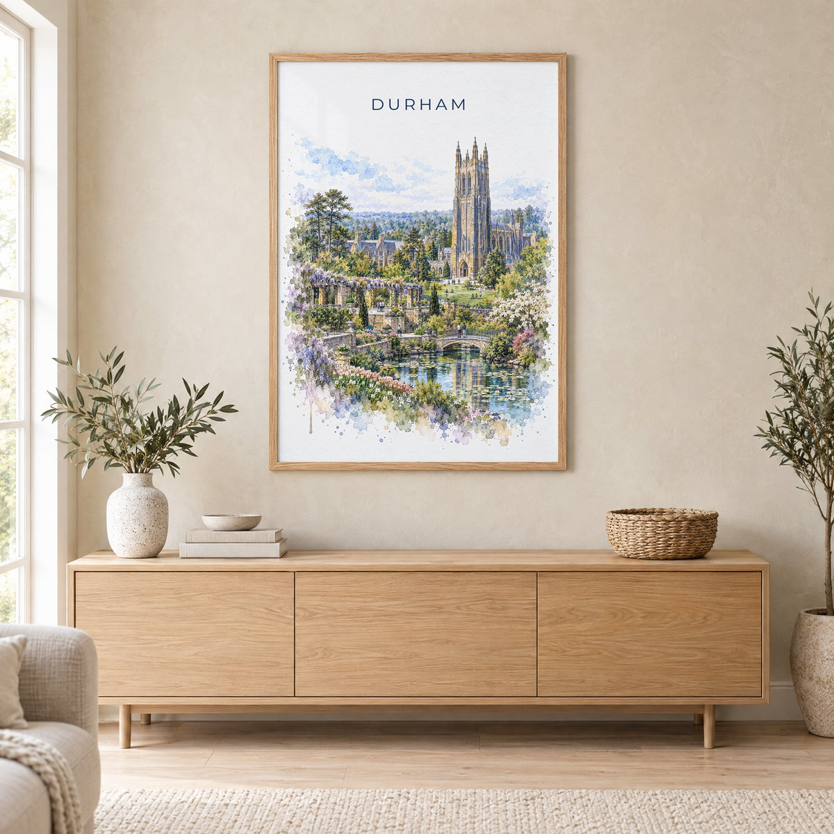 Durham, North Carolina watercolor print in an oak frame above a light wood sideboard in a Scandinavian living room