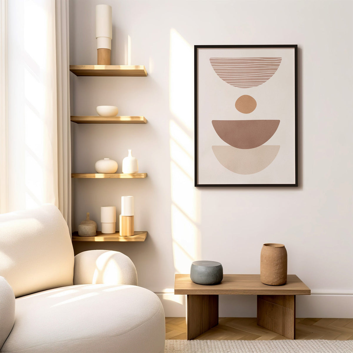 Dusty rose striped bowl shapes boho print in a black frame above a low wood bench beside floating oak shelves