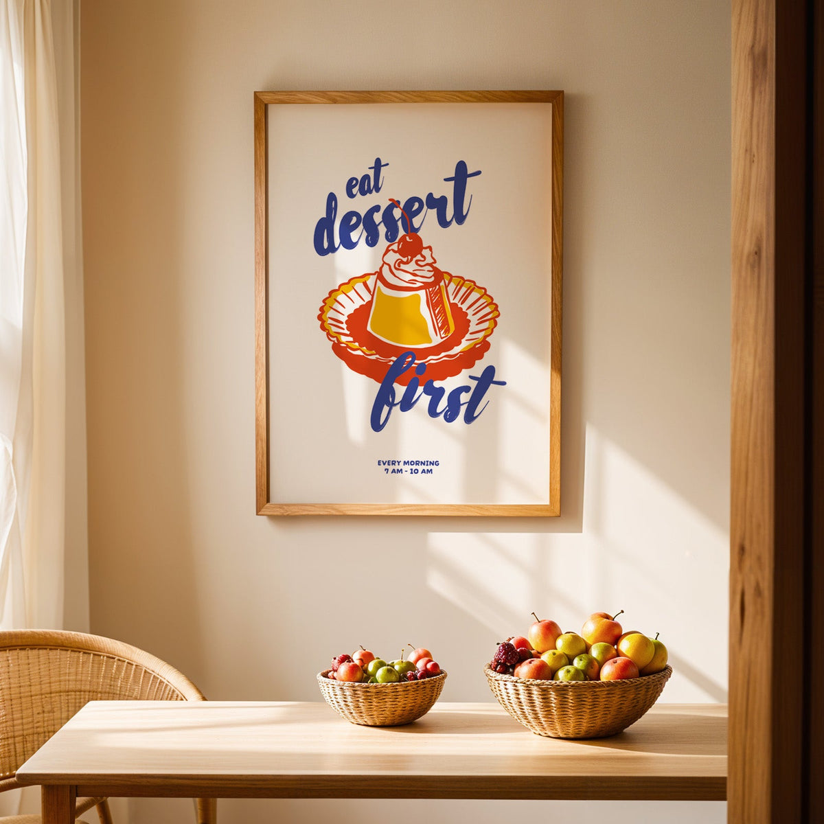Flan print in an oak frame hung above a dining table with wicker bowls of fruit