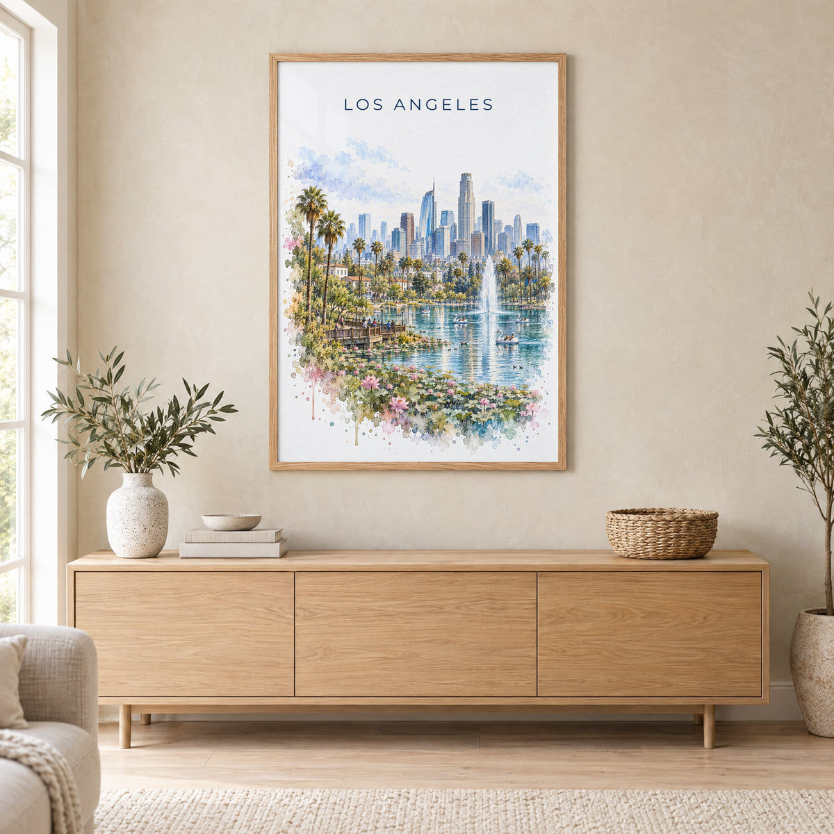 Echo Park Los Angeles watercolor print in an oak frame above a light wood sideboard in a Scandinavian living room