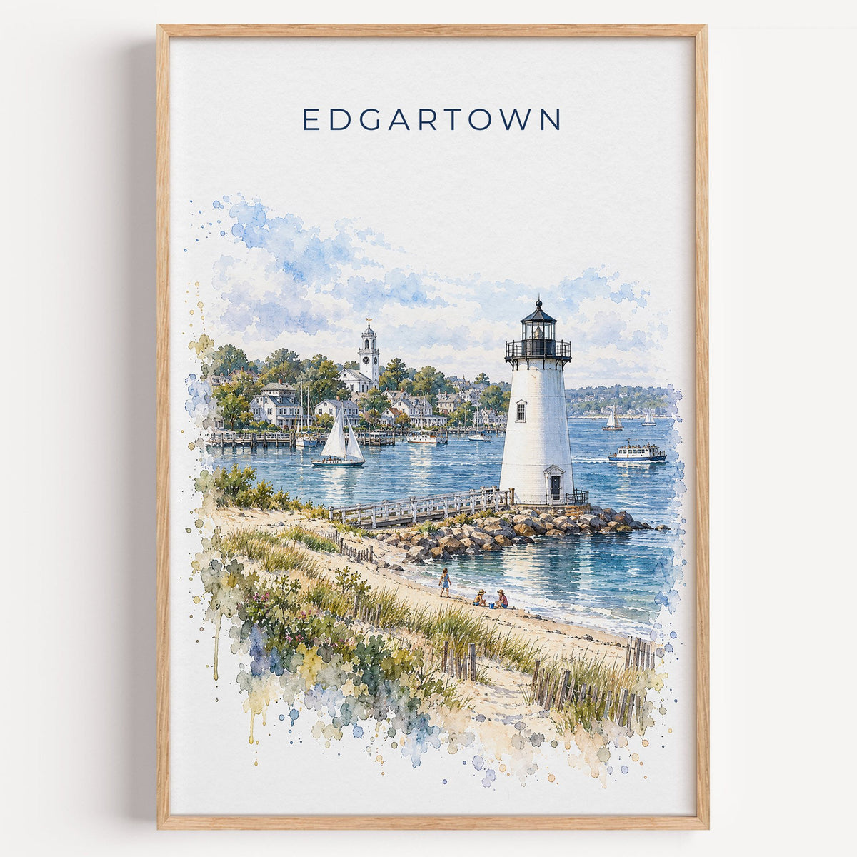 Edgartown watercolor print in a light oak frame on a plain white wall