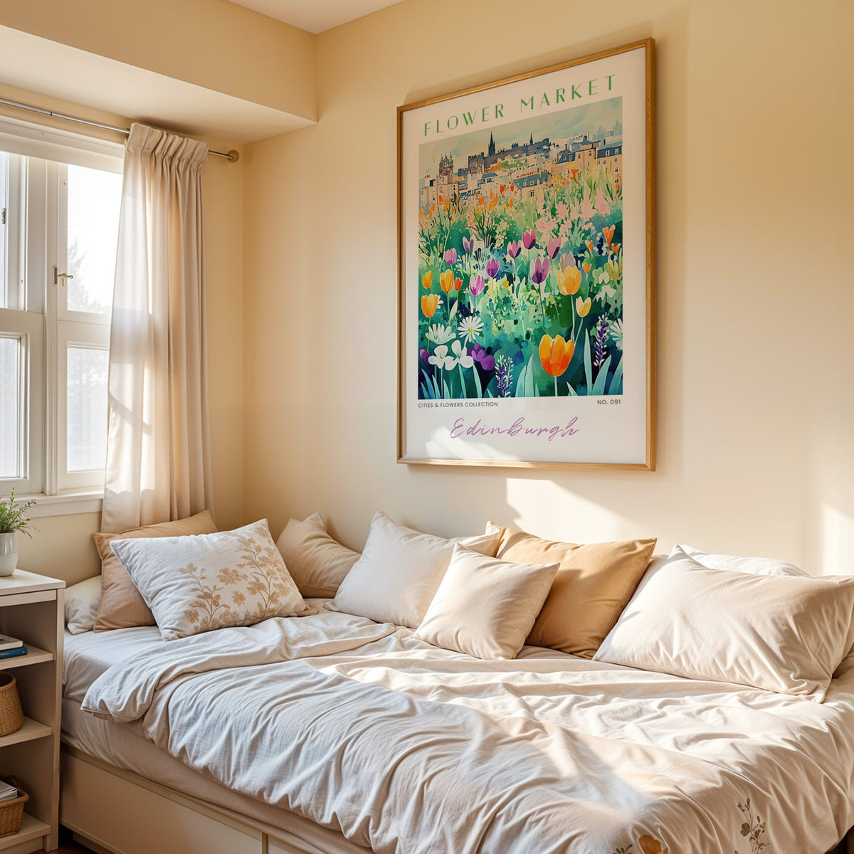Edinburgh flower market print in an oak frame above a cream daybed in a sunny bedroom