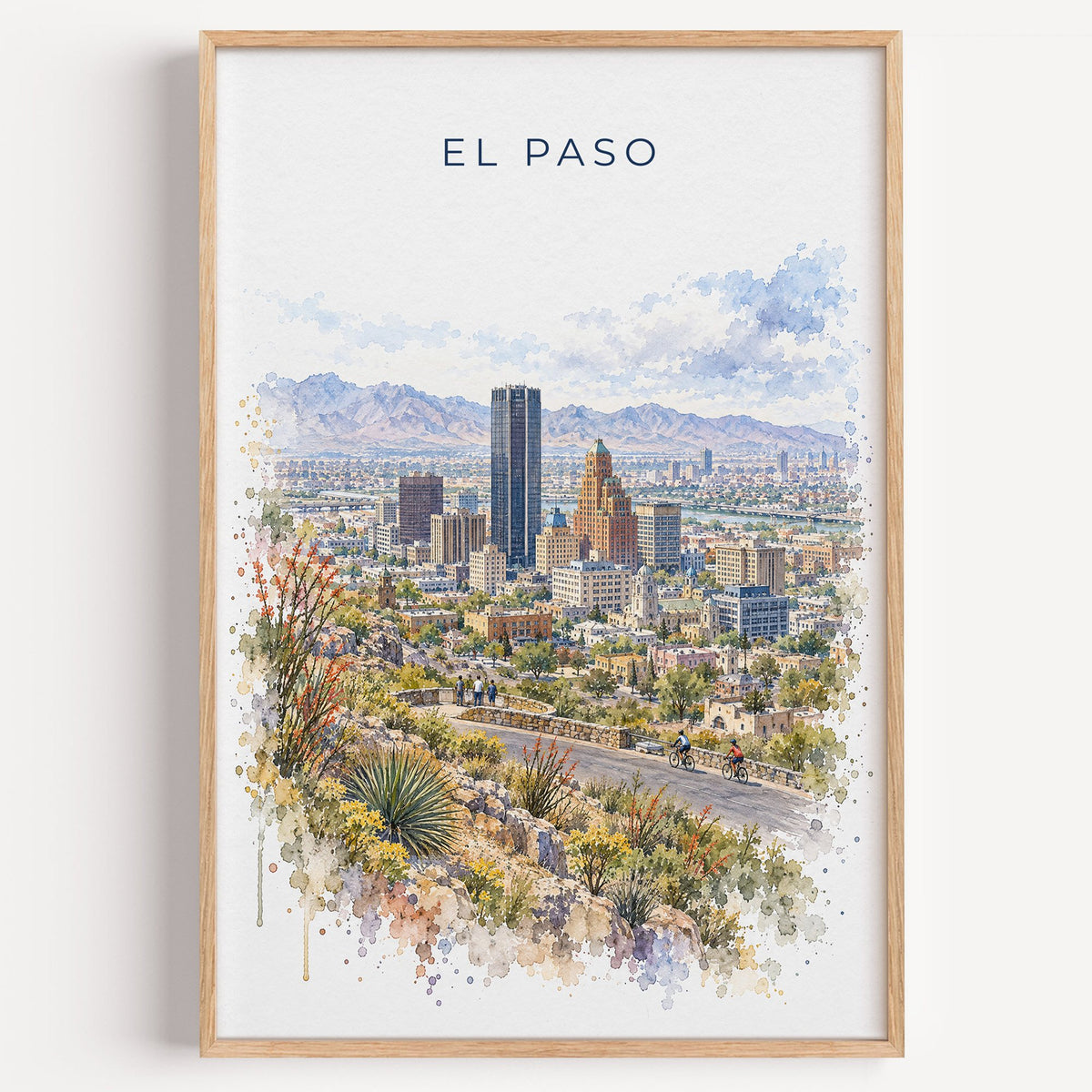 El Paso watercolor print in a light oak frame on a plain white wall