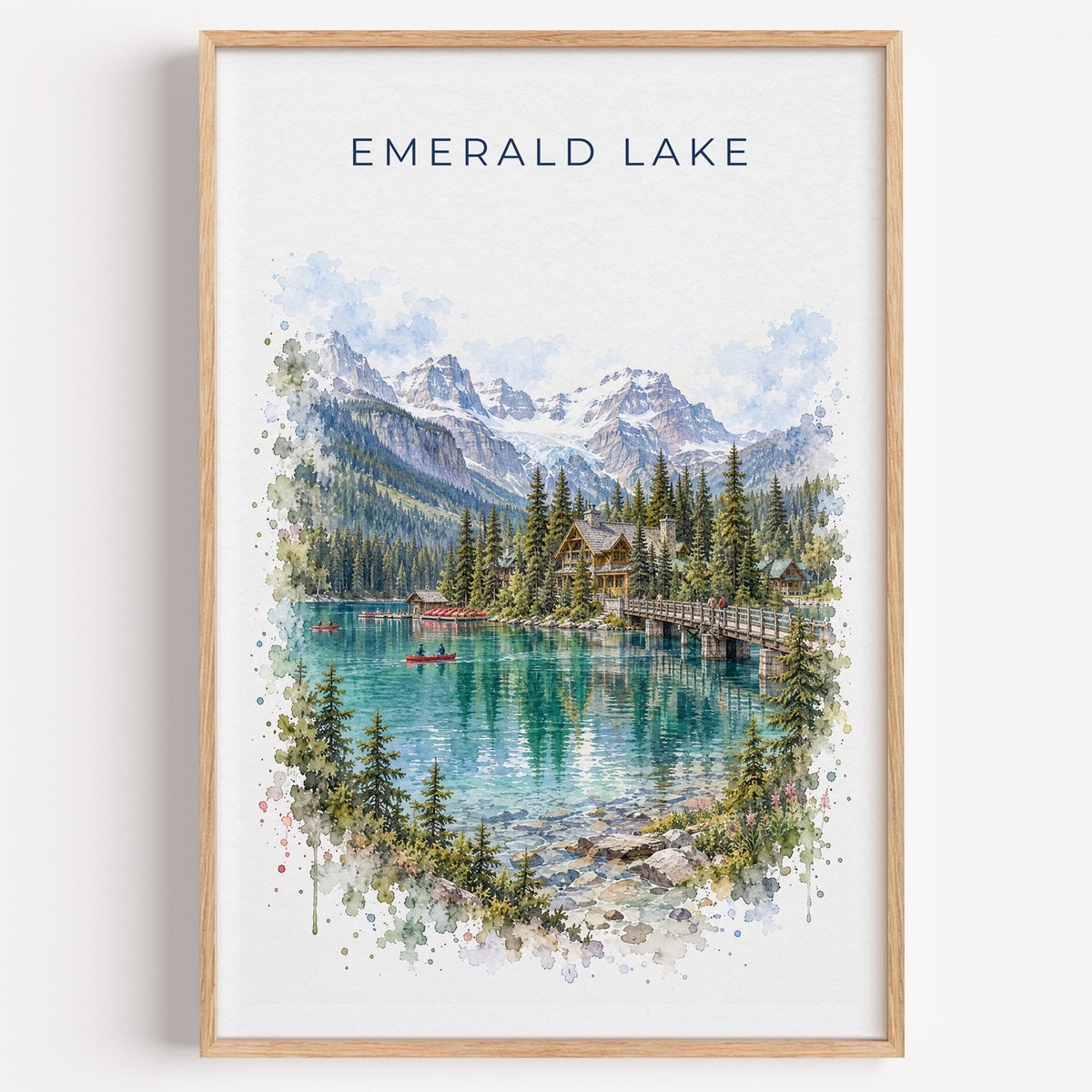 Emerald Lake, BC watercolor print in a light oak frame on a plain white wall