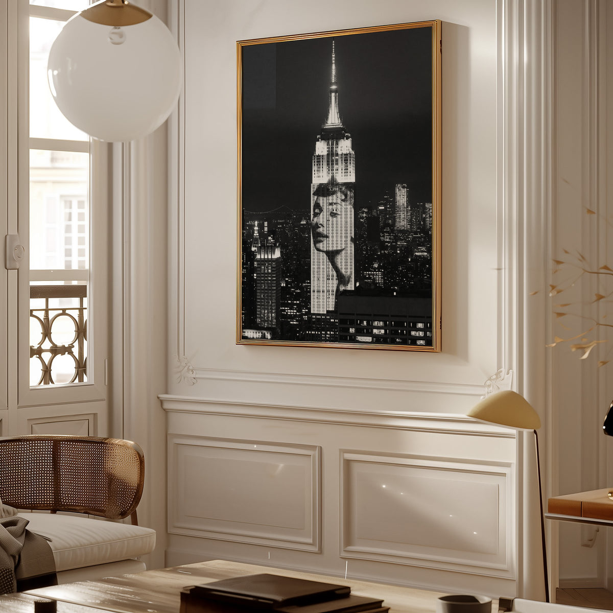 Empire State Building at night with projected face print shown in a gold frame in a Parisian paneled living room